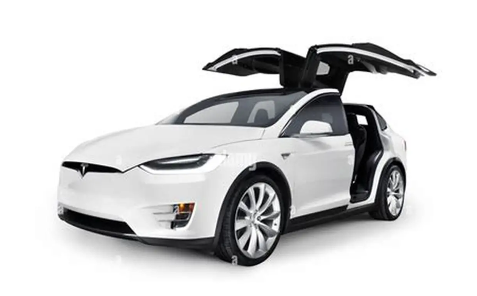 A white Tesla car with gull-wing doors open.