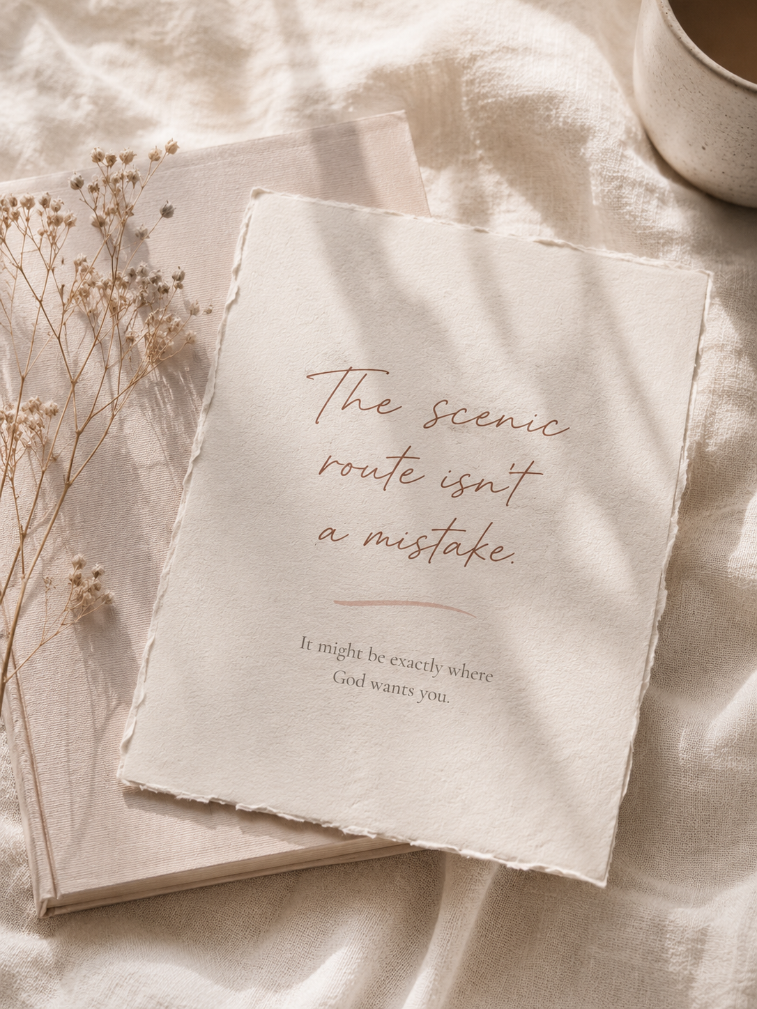 Devotional quote on torn paper: "The scenic route isn't a mistake. It might be exactly where God wants you."