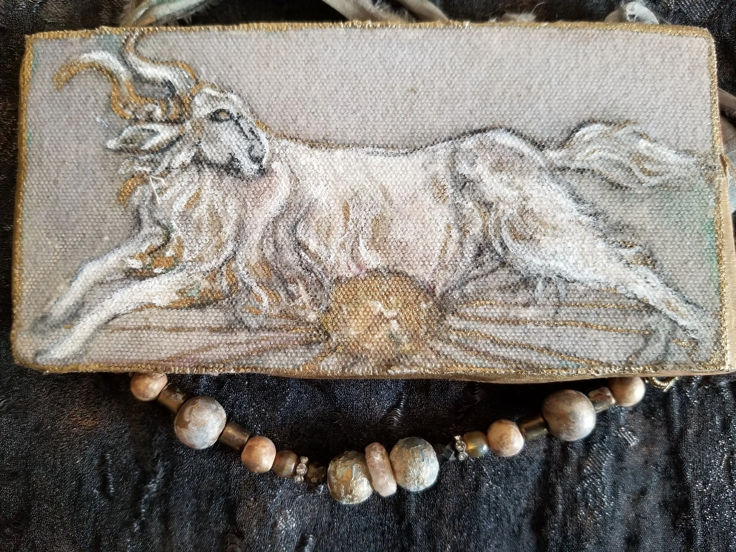 Ram & Gilded Sun on Wood
