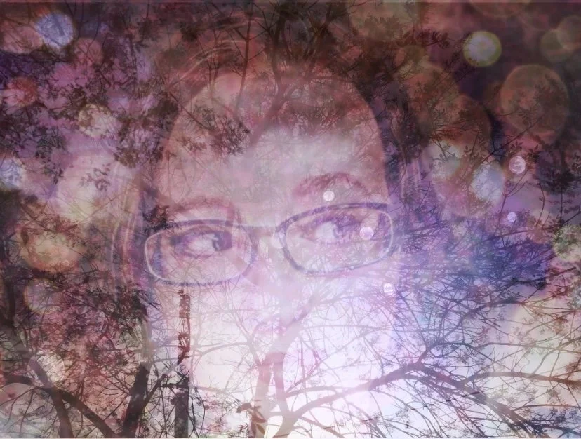 A person's face blending with tree branches and colorful bokeh lights, creating a double exposure effect.