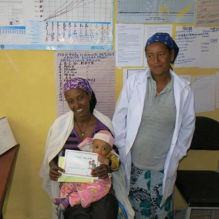  Baby gets a certificate of vaccination. 
