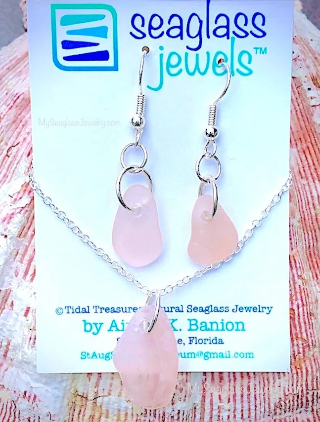MySeaglassJewelry.com beachglass jewelry set including earrings and a pendant, featuring pale pink sea glass on silver hooks and chain, by artist Aimee Wiles Banion.