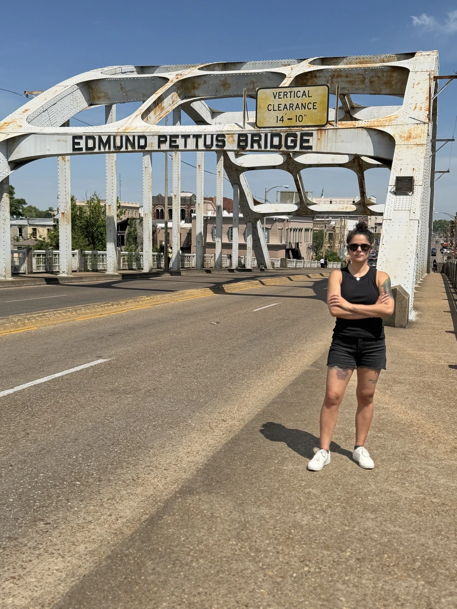 Amanda Nelson stands on the Edmond Pettus Bridge.