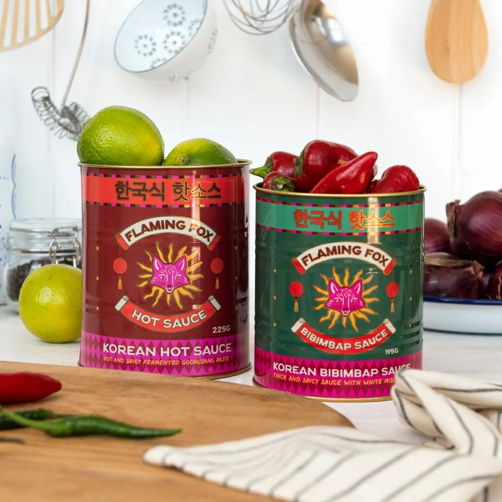32055-Medium-storage-tins-(set-of-2)-Flaming-Fox-Sauces-lifestyle-1.jpg