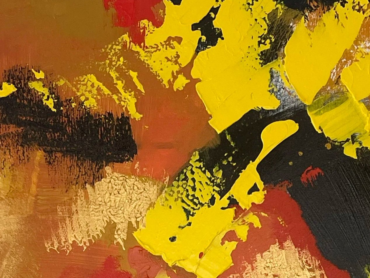 Abstract painting with bold splashes of yellow, red, black, and white colors.