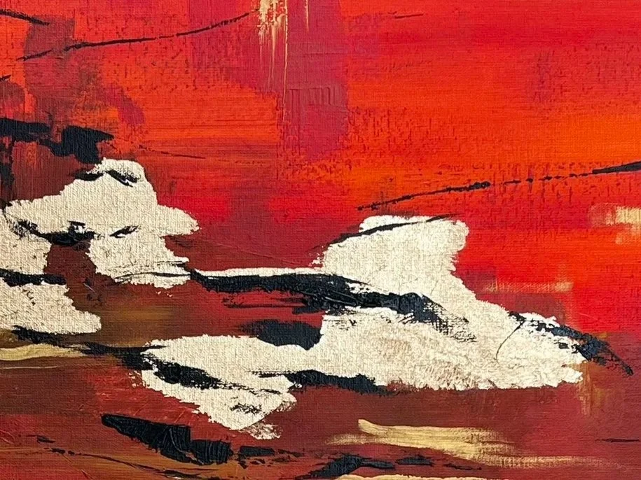Abstract painting with red, black, white, and hints of gold colors.