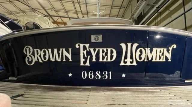 Triple layered White lettering with 2 outline layers in Gold and Black