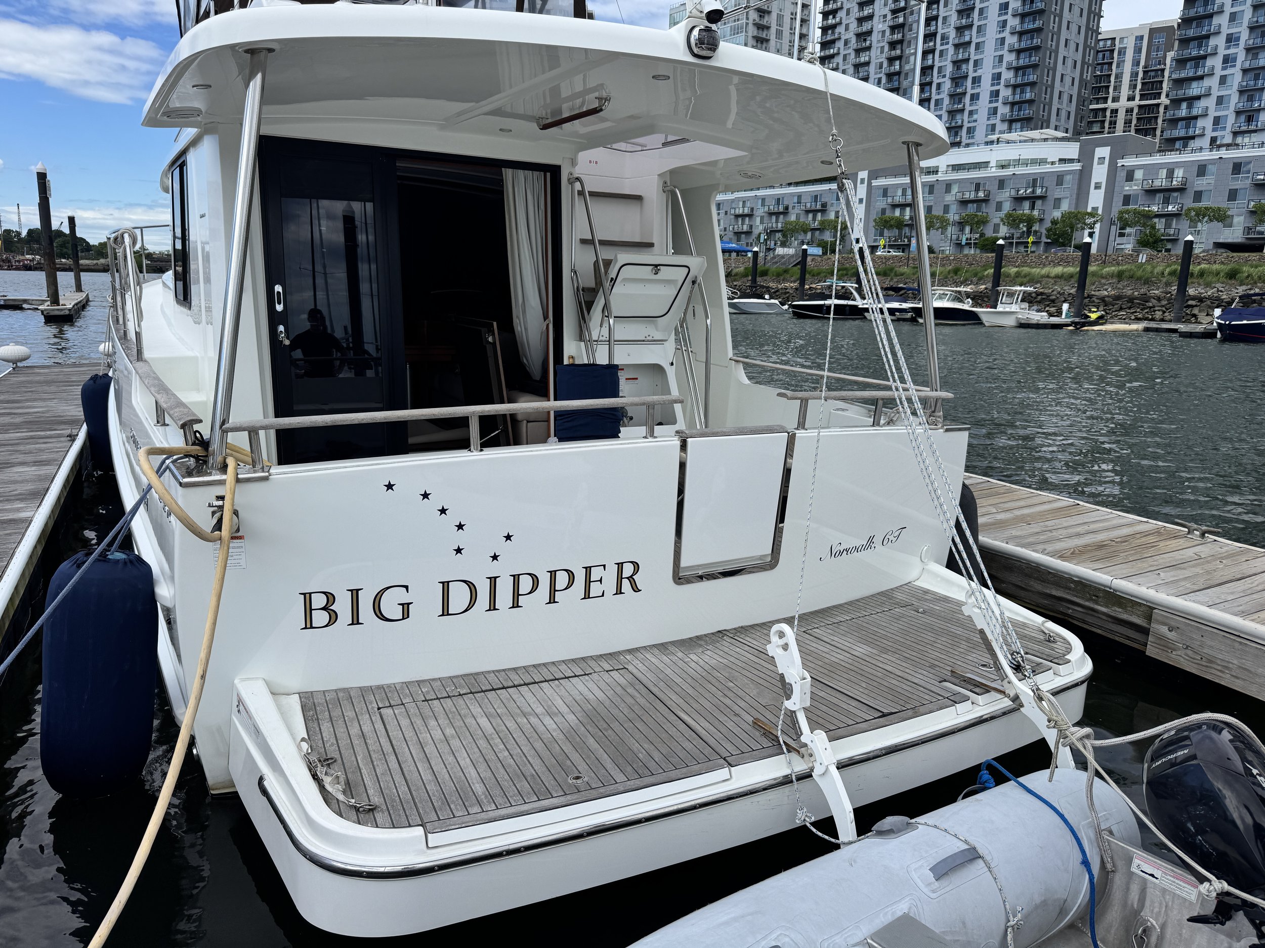 22K Real Gold Burnished lettering accents on dark blue lettering and star graphics 