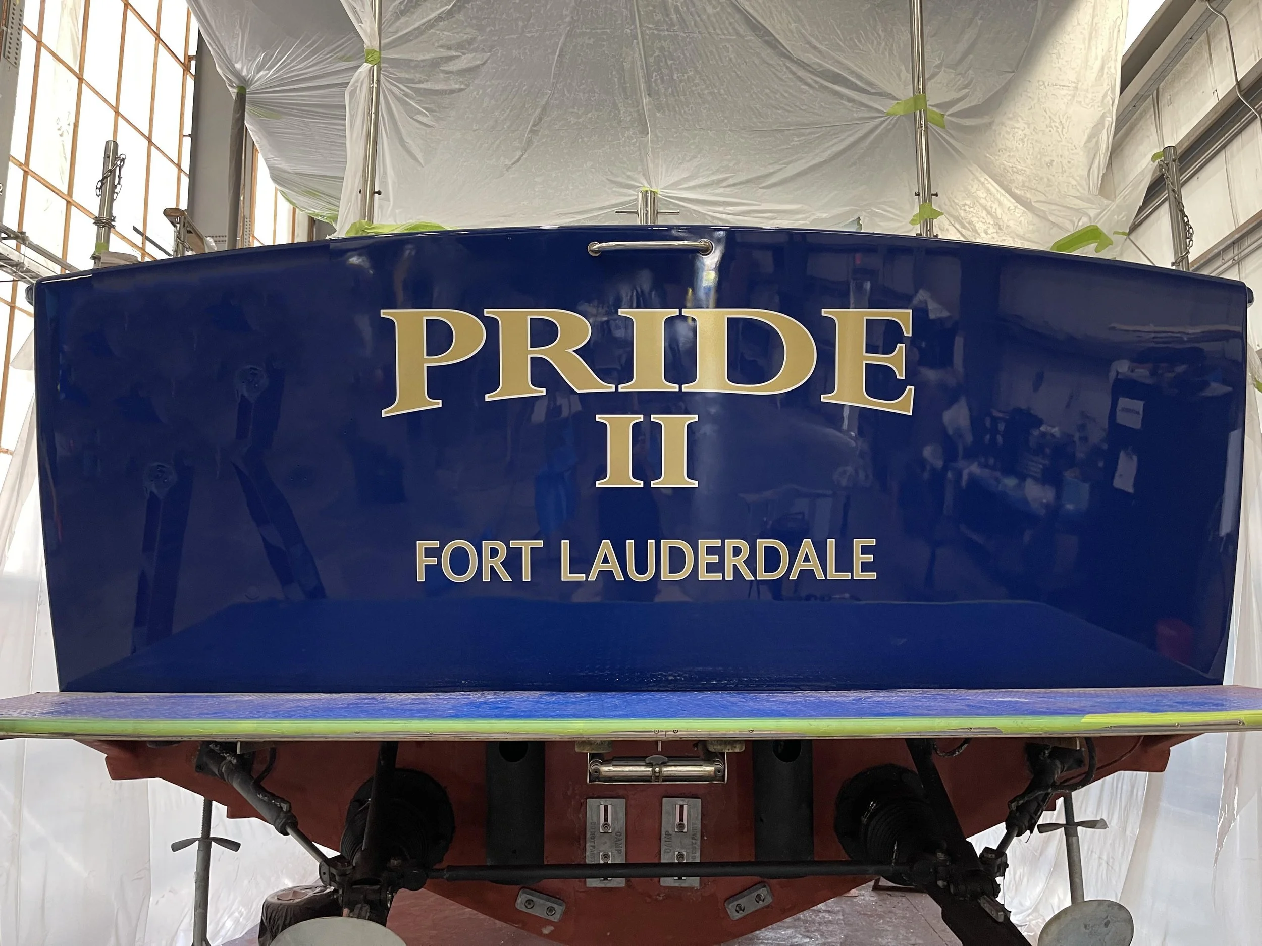 22K Real Gold brand burnished gold lettering with white outline