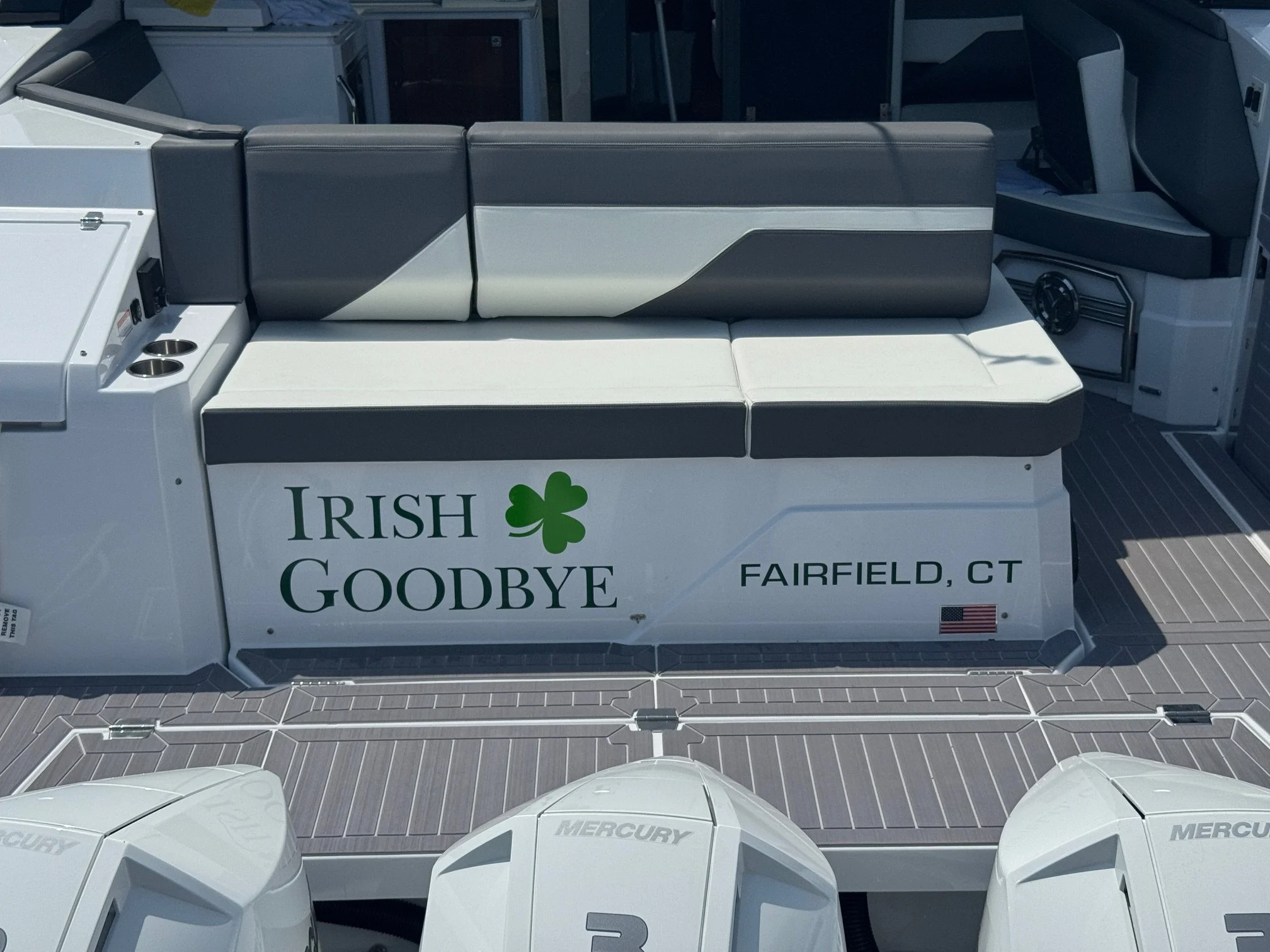 Dark Green lettering and shamrock graphic