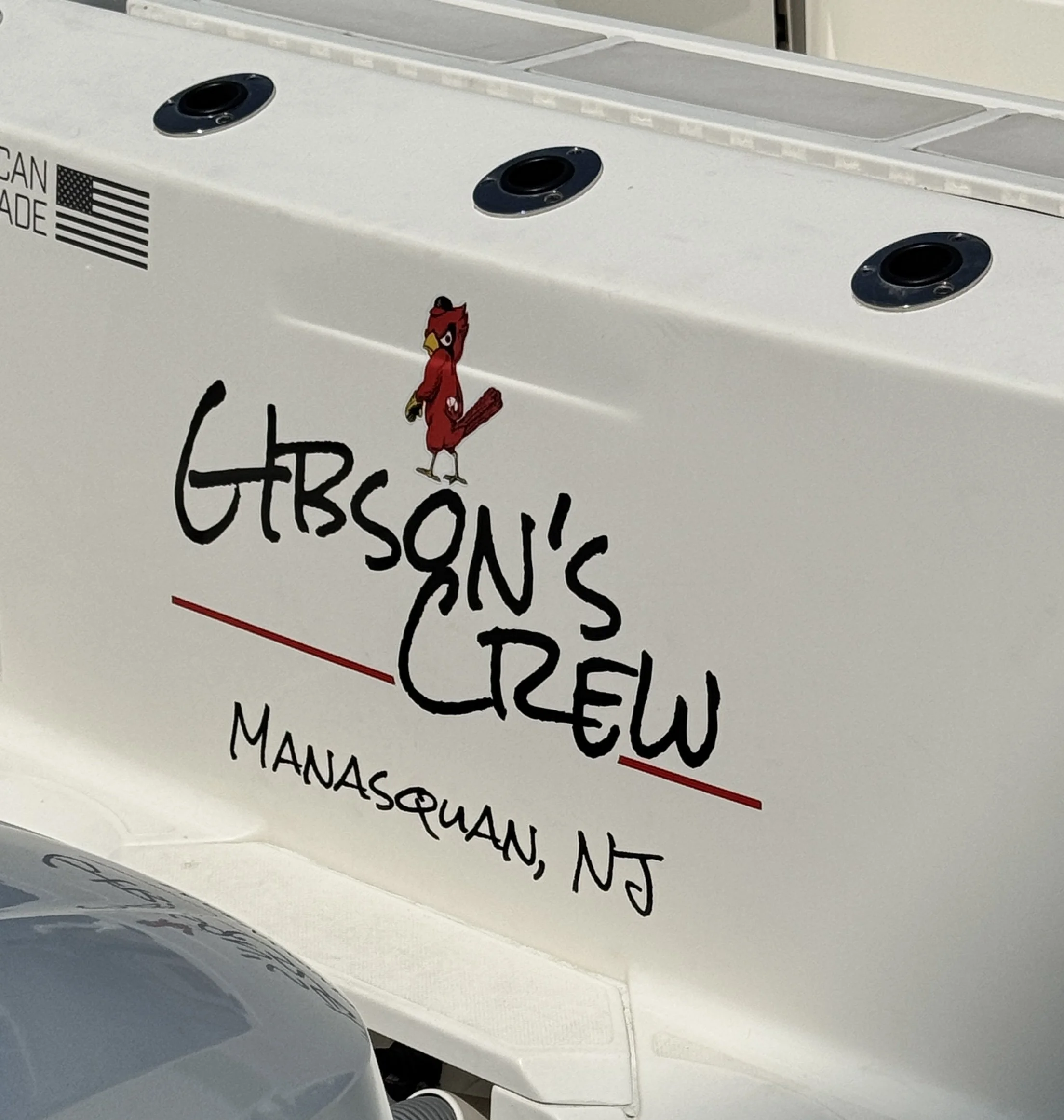 Black lettering with red line detail and custom printed Cardinal 