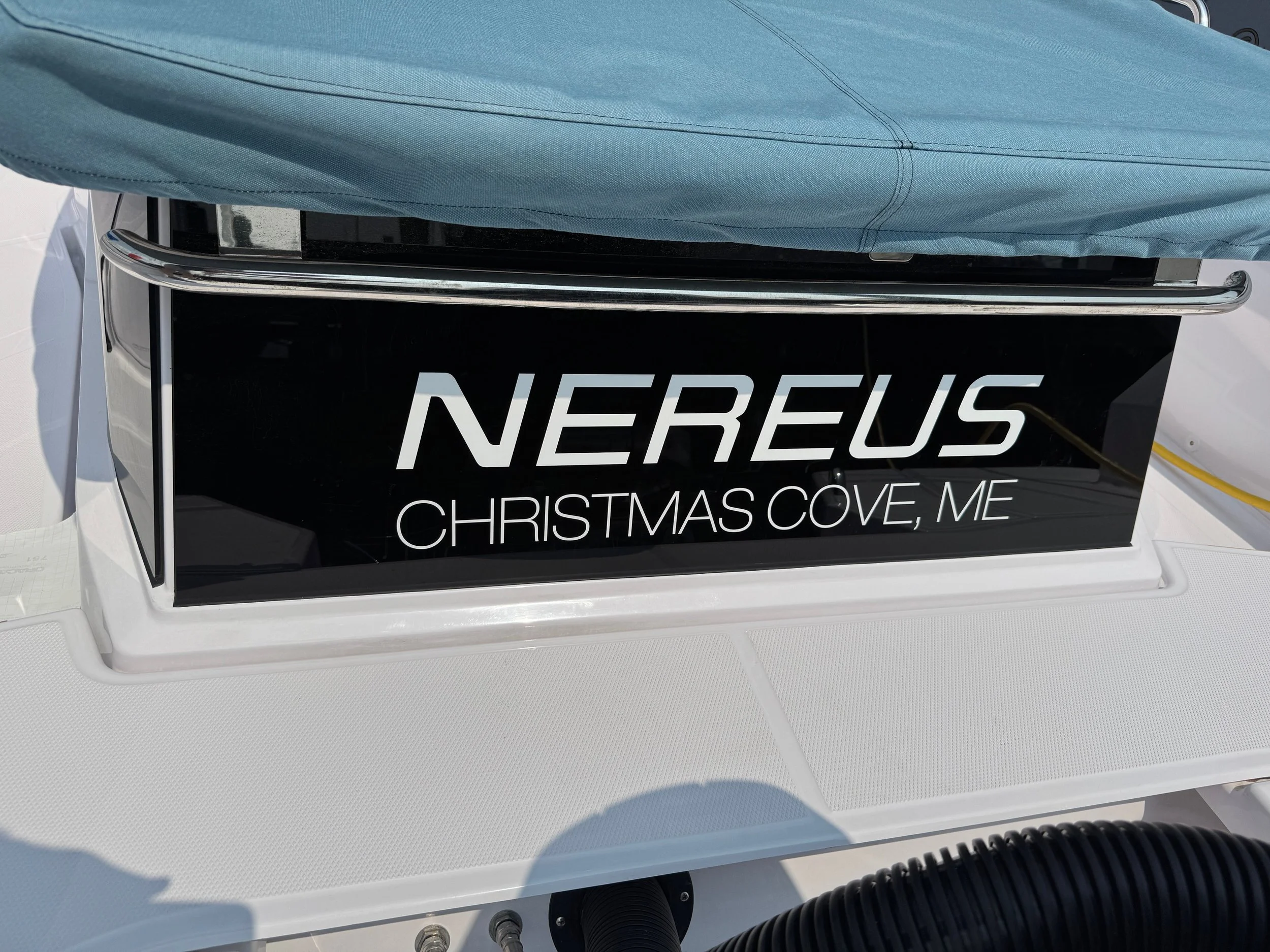 White lettering on black translucent  surface