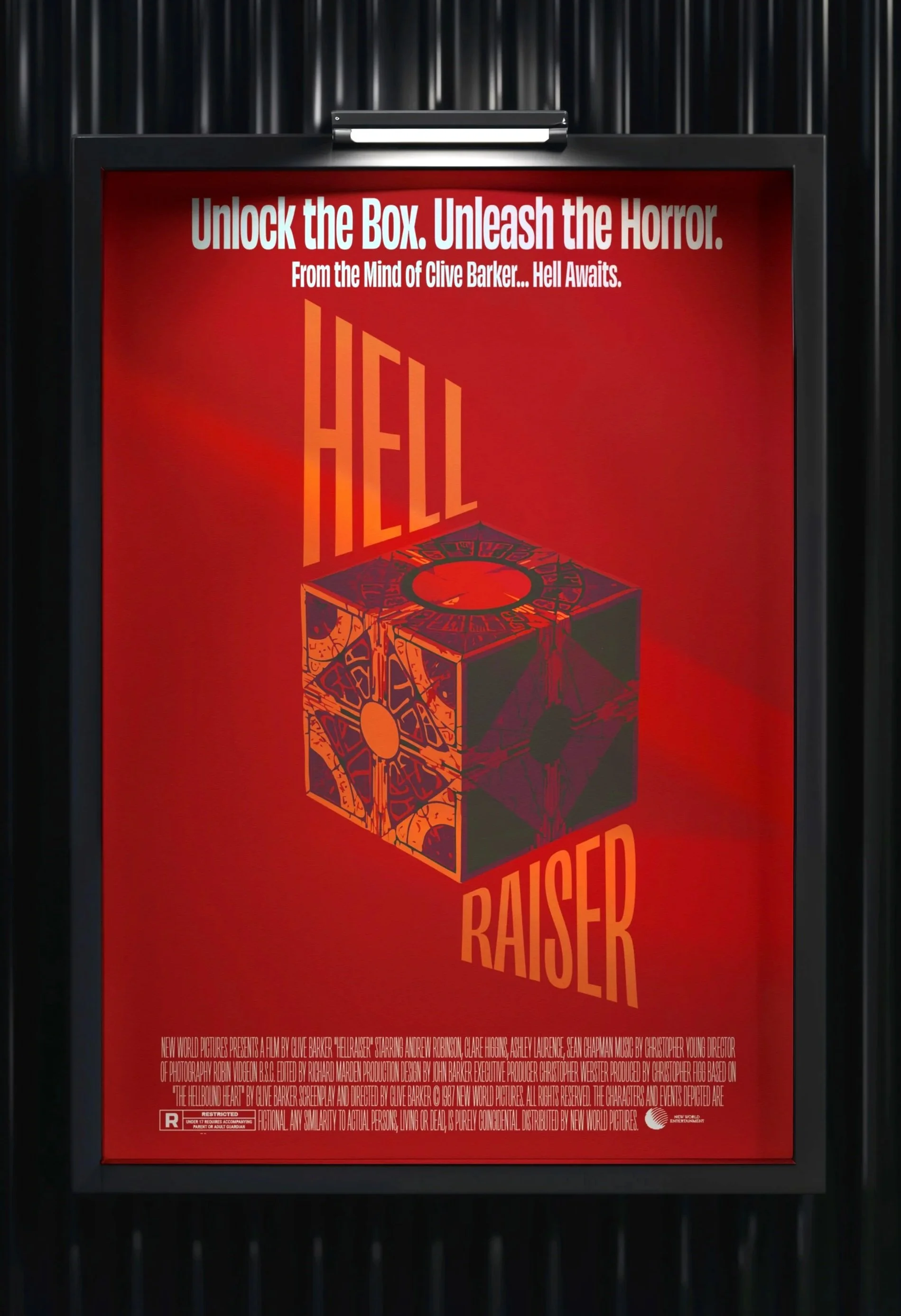 Poster with red background and a three-dimensional cube with intricate designs. Text on the poster reads: "Unlock the Box. Unleash the Horror." at the top, and "Raiser" at the bottom.