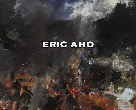 The name 'ERIC AHO' is written in bold white letters over an abstract dark, smoky, and fiery background.