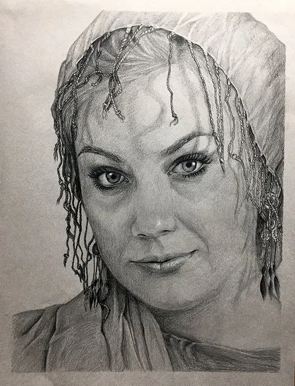 Detailed pencil drawing of a woman with wet hair styled in dreadlocks, wearing a headscarf and a patterned top, with expressive eyes and a subtle smile.