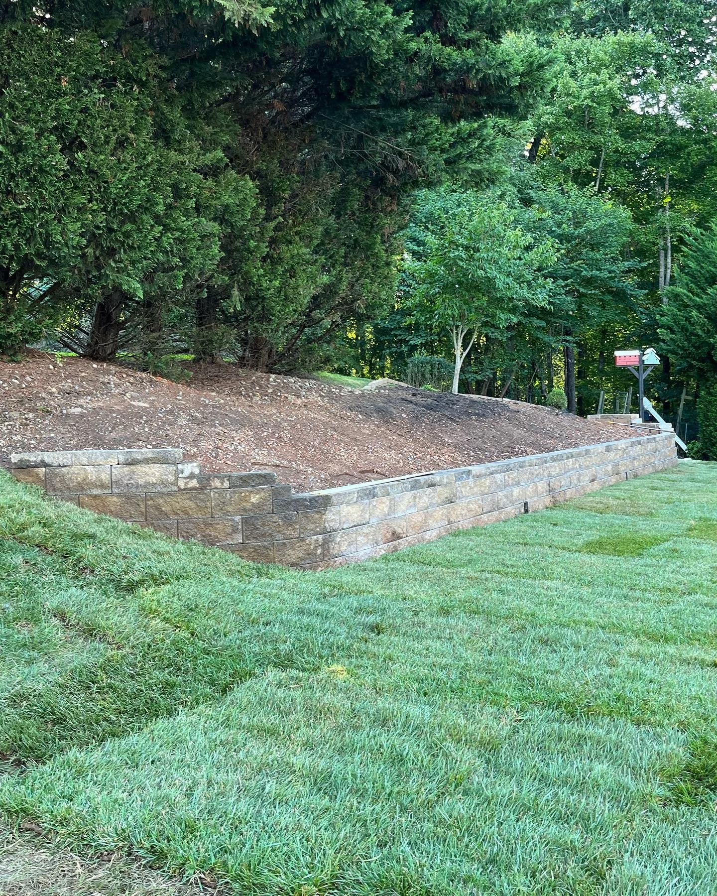 Richmond Retaining Wall Construction with Sod and Trees