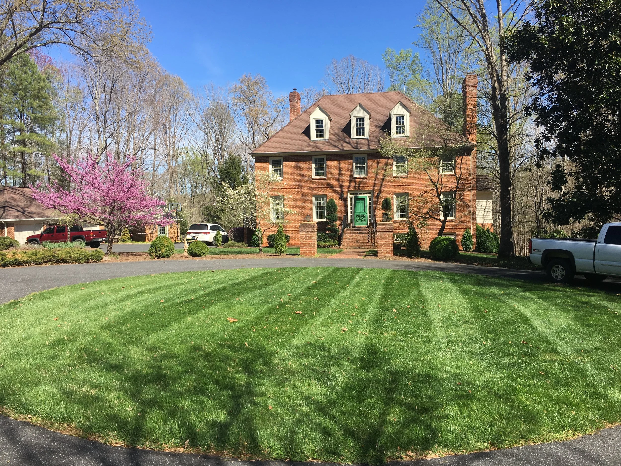Recently mowed lawn with stripes in Richmond, VA