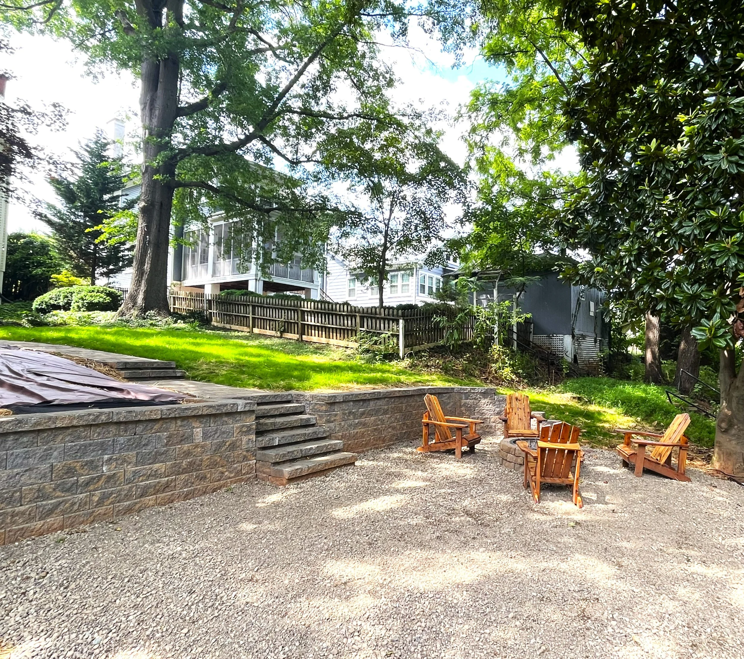 Residential Retaining Wall with Paver Walkway and built in staircase with gravel patio