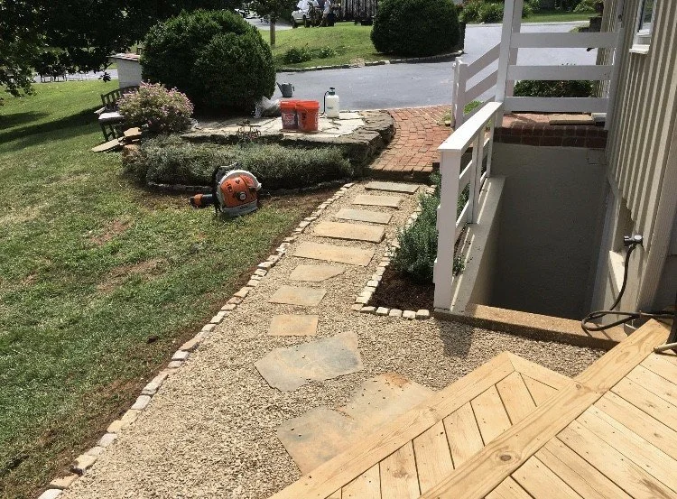 Flagstone walkway with decorative stone