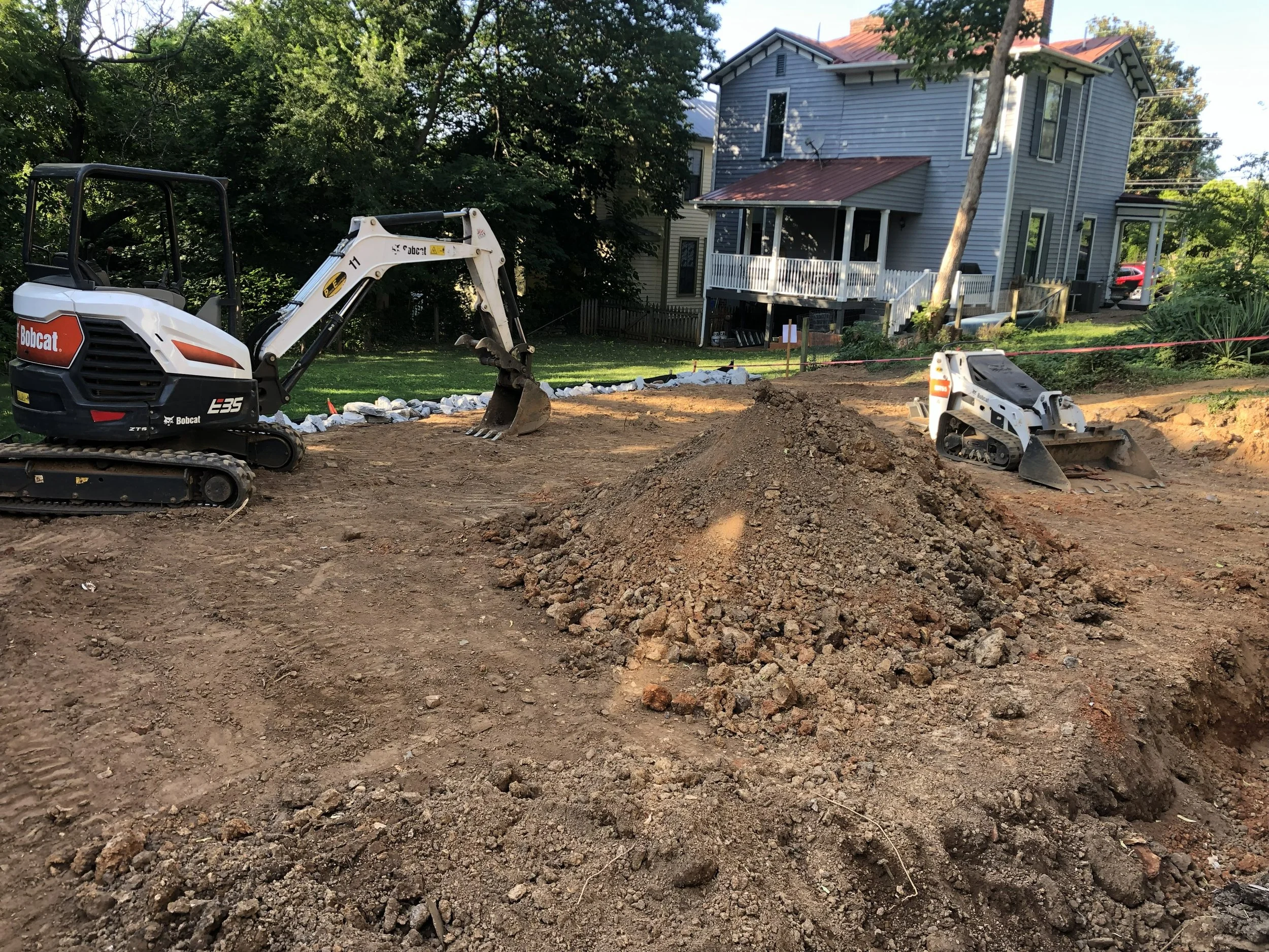 Excavation and grading site for new retaining wall project