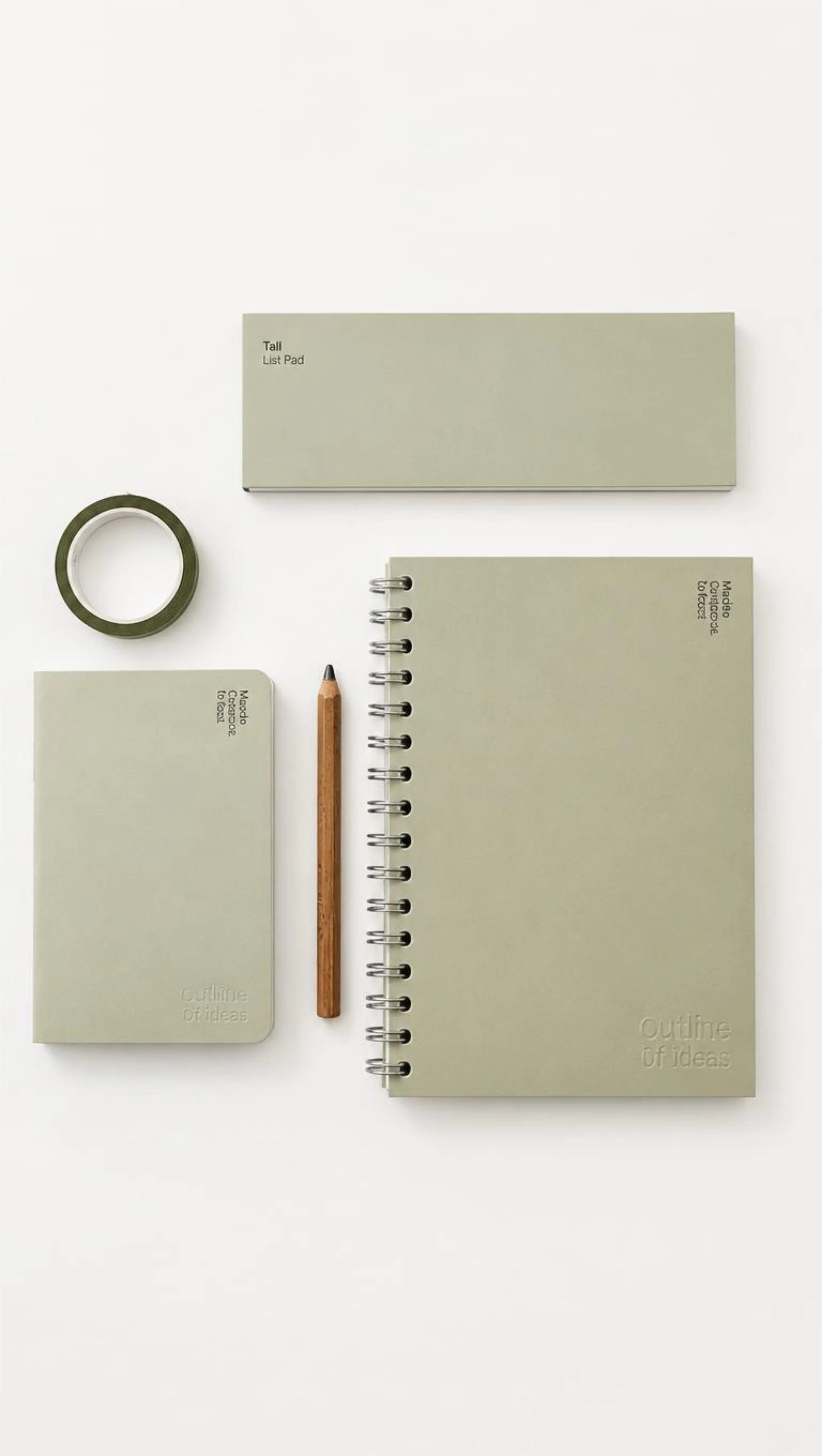 A flat lay of office supplies on a white background, including a spiral notebook, a small notebook, a pencil, and various boxes and tape with a muted green color.