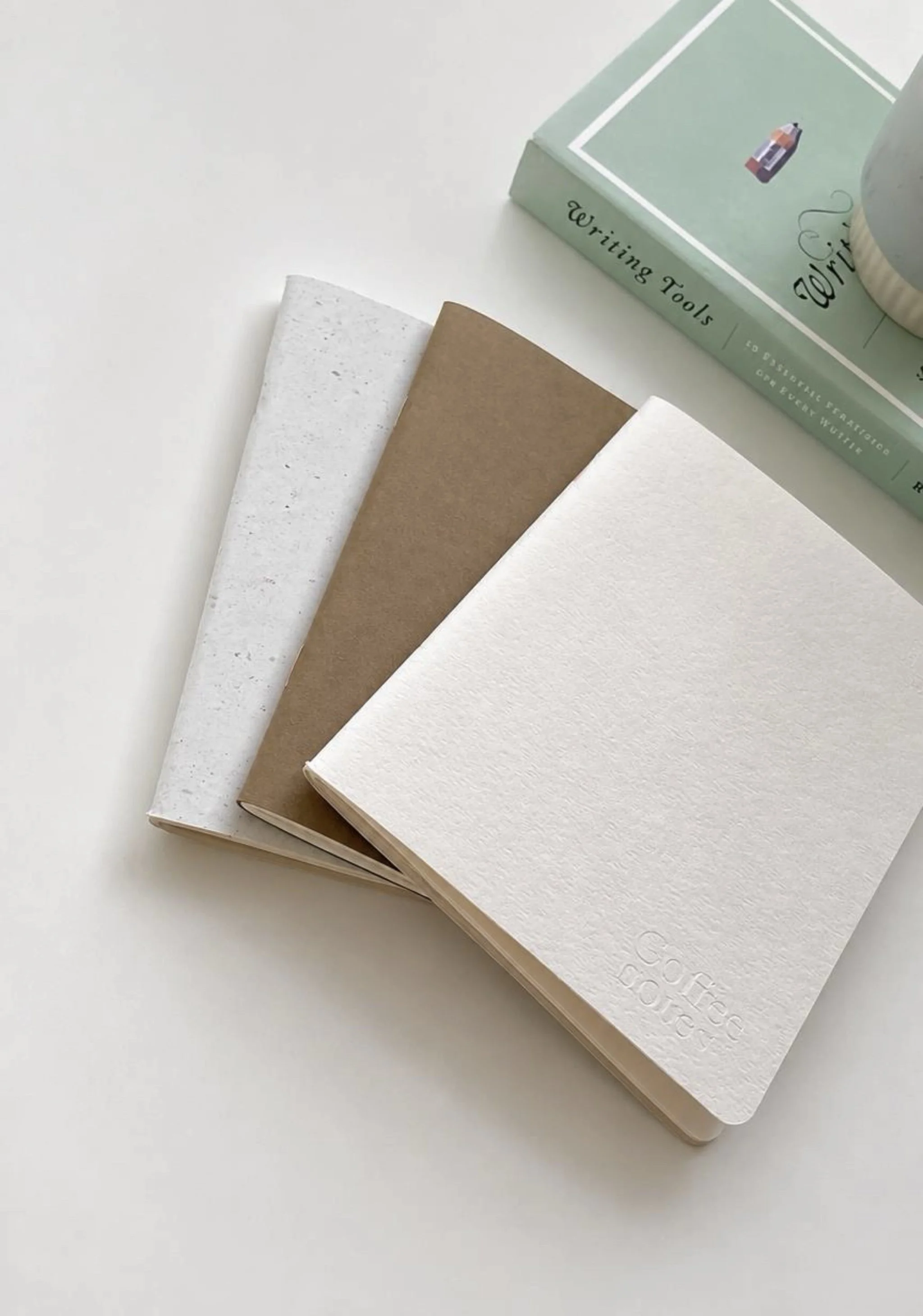 Curated notebooks made with recycled coffee paper cups and minimalist design for writing, journaling , and everyday use