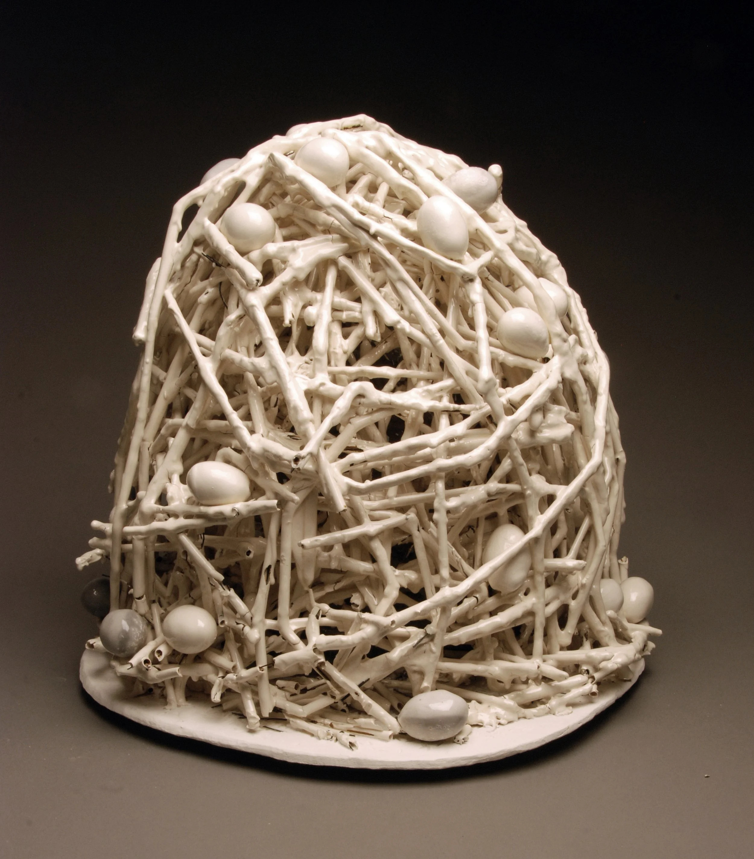 Nest I, 2012
Casting slip, bamboo, wire, glaze
Dimensions: (w, d, h) 16” x 12” x 12”