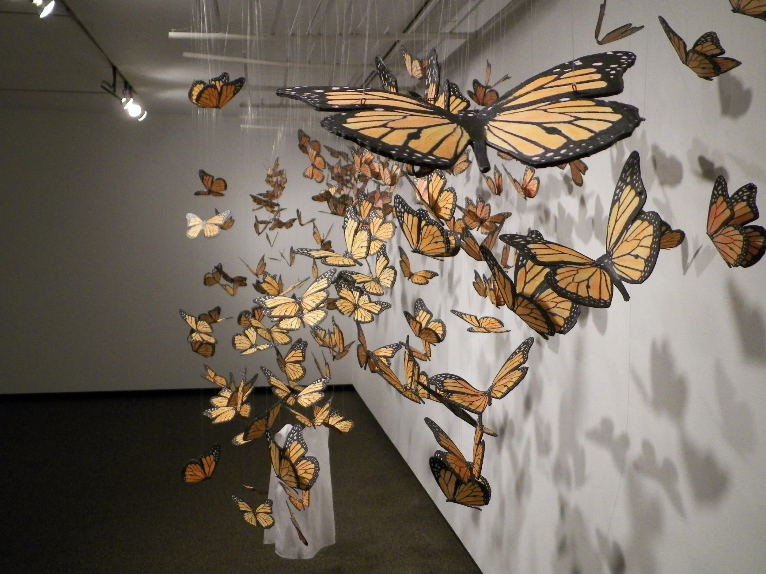 Passage of Memory II, 2013
Screen printed porcelain, wood, monofiliament
Dimensions of overall installation: (w, d, h) 18’ x 6’ x 12’ at the Fort Worth Community Art Center