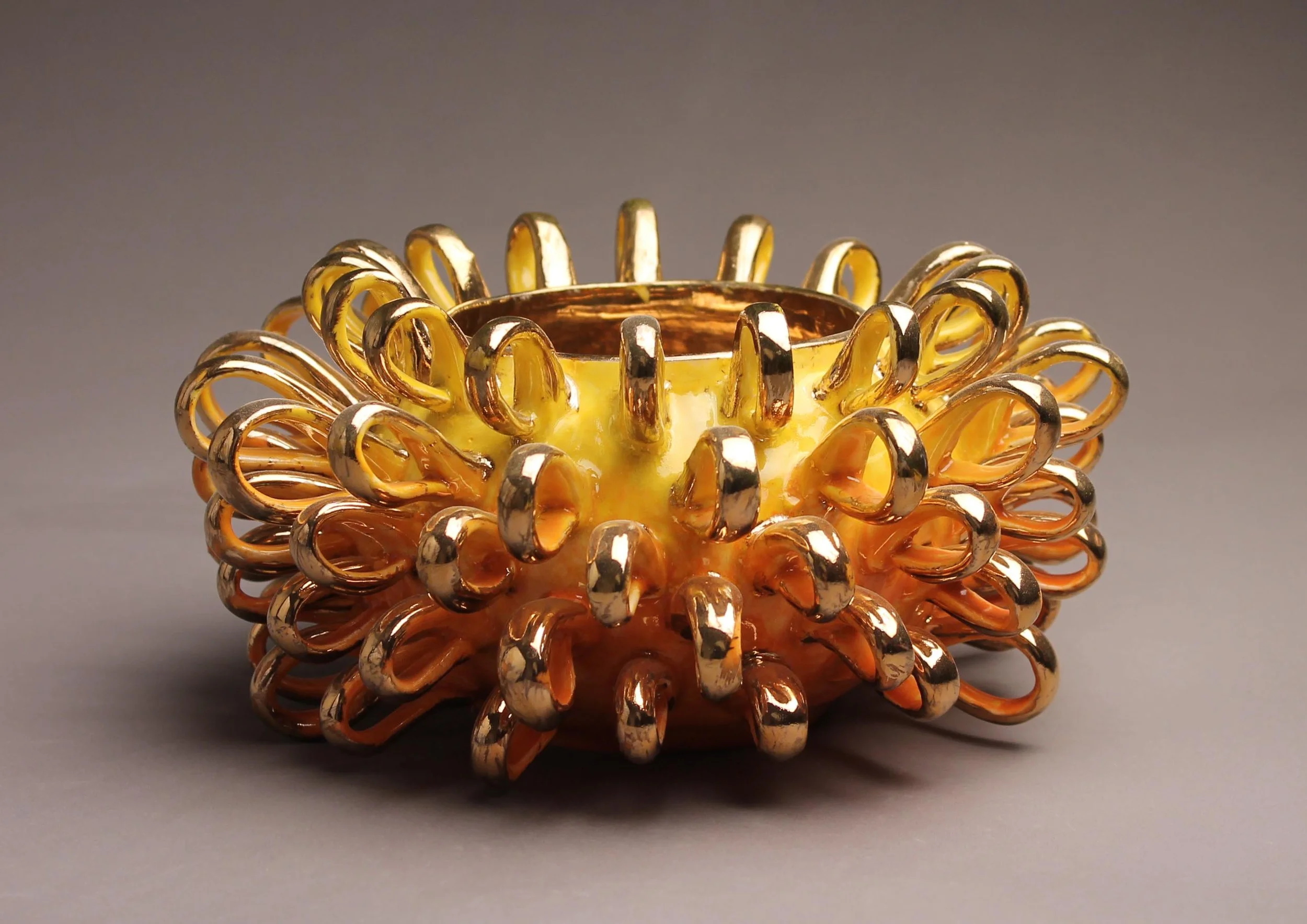Golden Puffer, 2013
Porcelain, thrown, multiple firings and luster
Dimensions: (w, d, h) 8” x 8” x 8”