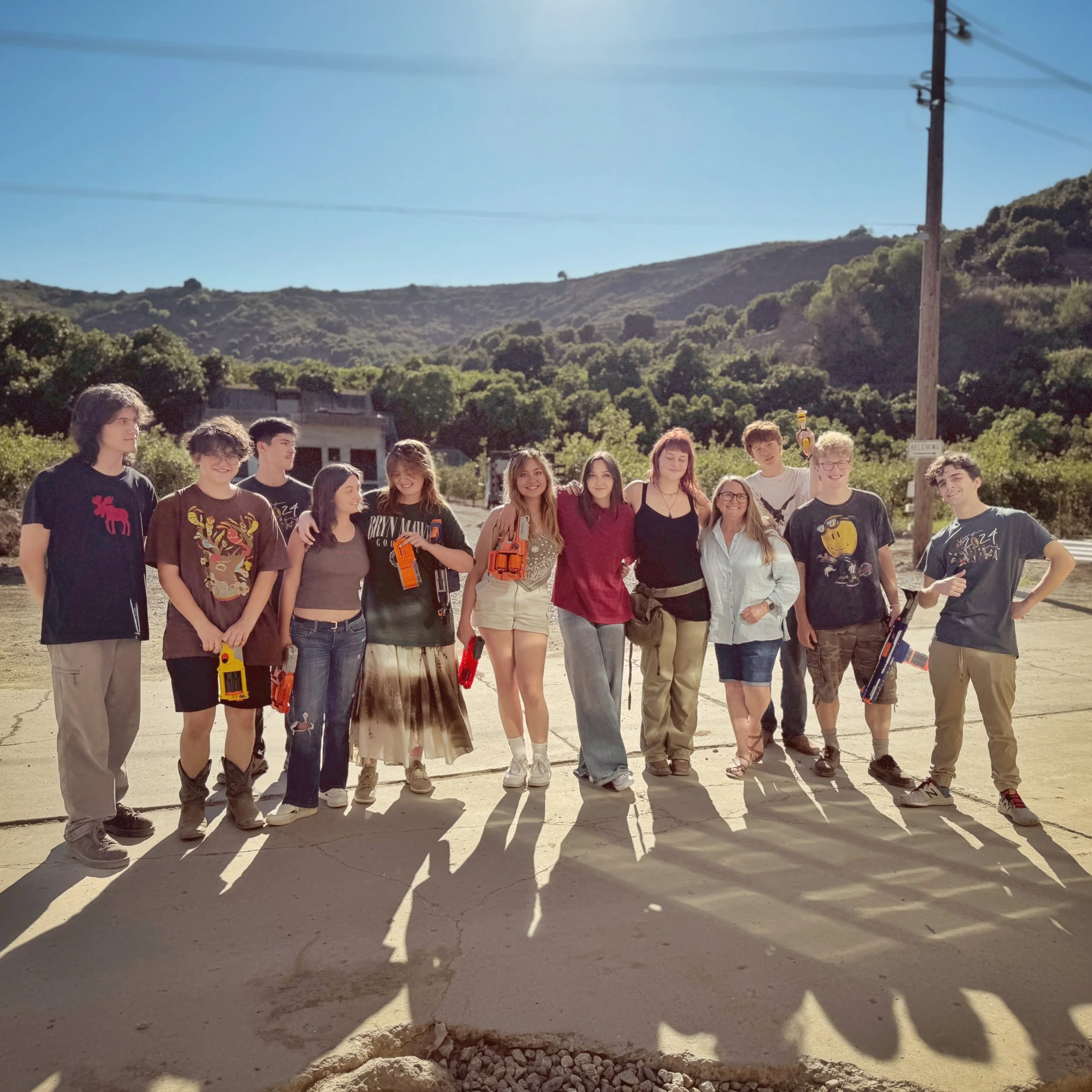 An open-air gathering for a graduating senior class.