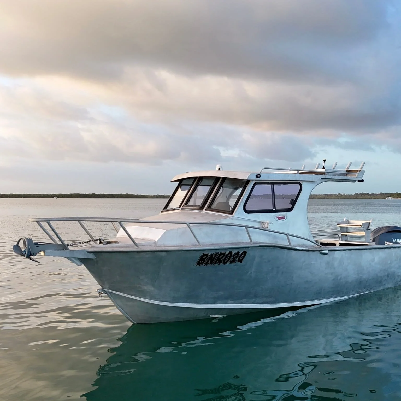 infinite-fabrications-custom-aluminium-boat-brisbane-on-water-front.jpg