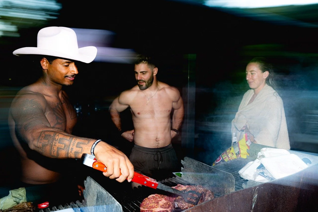 Team HAOS making steak dinner after training