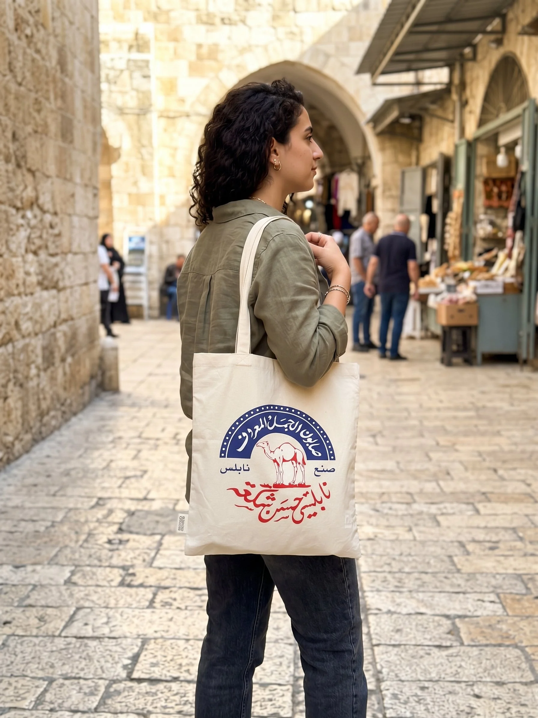 Carrying Al-Jamal soap tote bag.jpeg