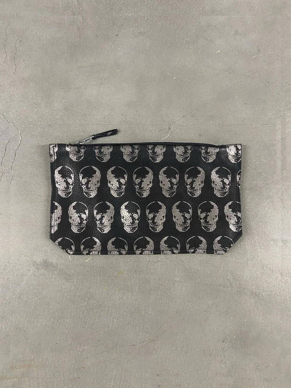 Indie metallic skull leather clutch