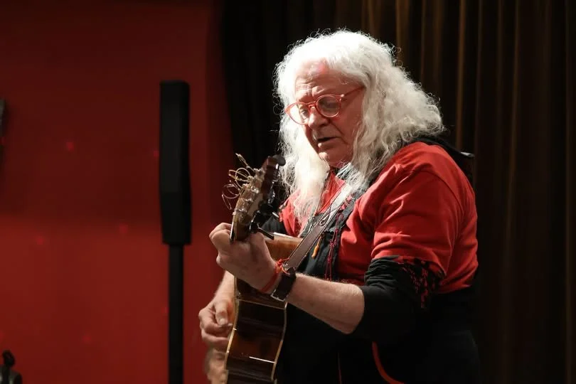 Ian Paulin performing an original song at CanberraWAX Wax Lyrical Song Circle Canberra.jpeg