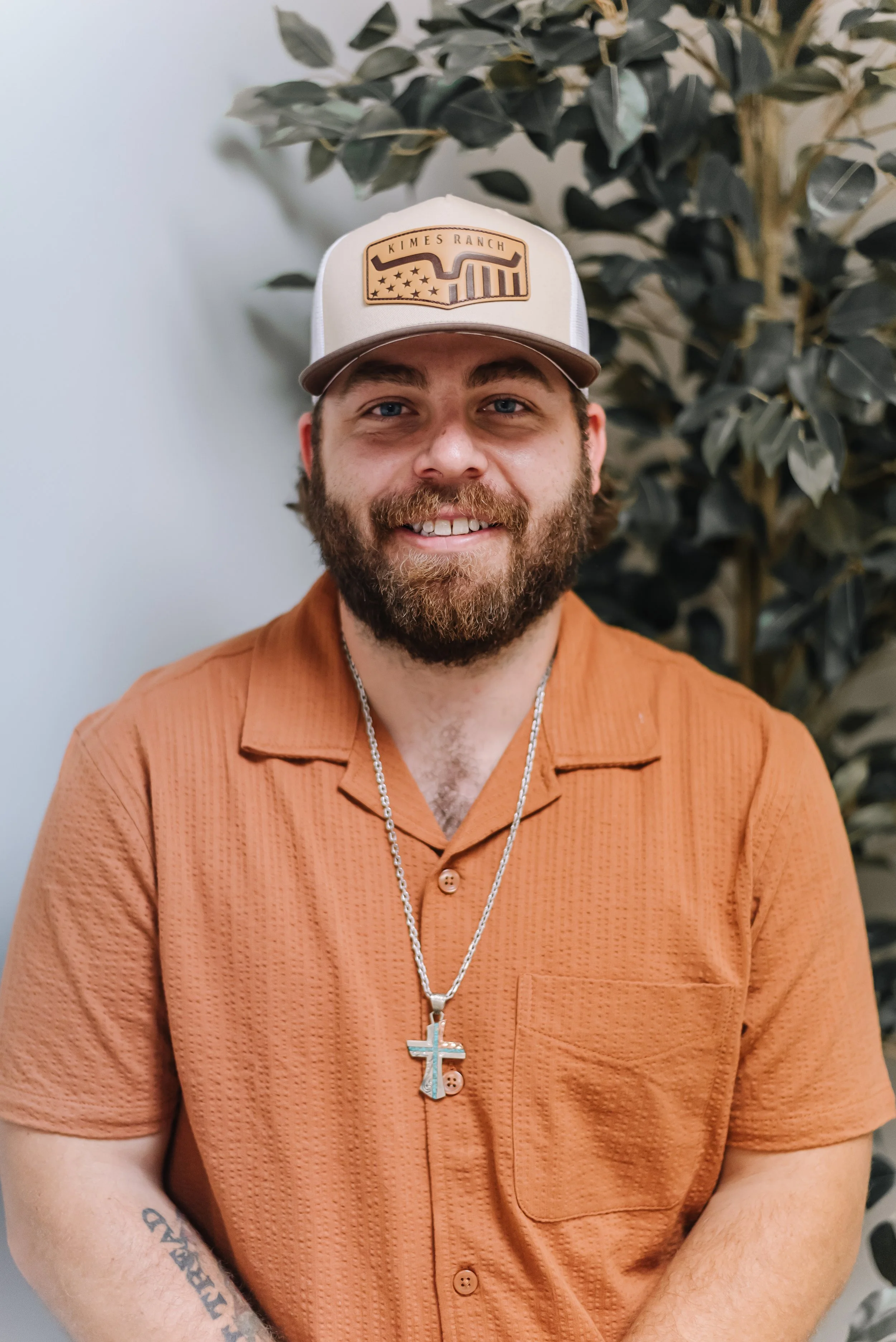Austin, a grief recovery specialist at Bond Greif Collective, helping clients navigate loss and healing, in Manhattan, Kansas.
