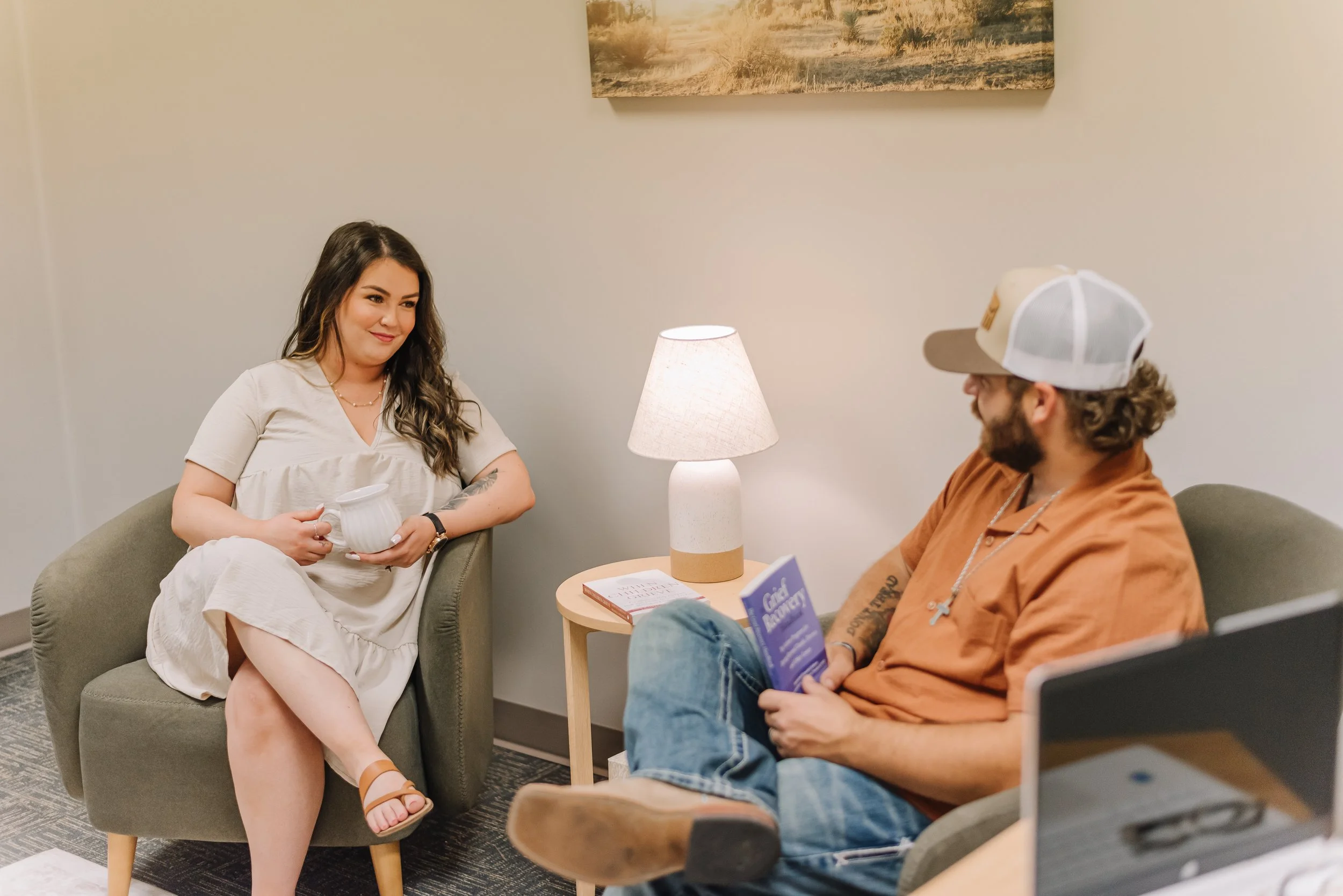 Olivia and Austin ready to meet with a client to discuss compassionate grief support and provide recovery guidance - in Manhattan, Kansas.