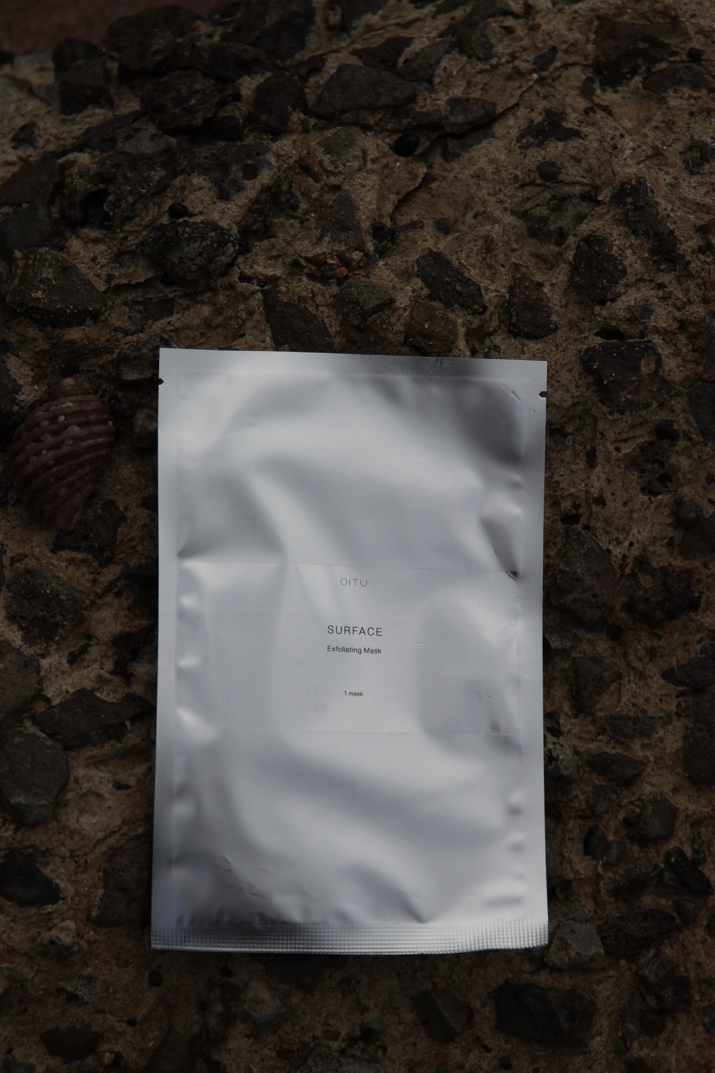 OITU Enzyme SURFCE sheet mask, for clinical exfoliation from home.