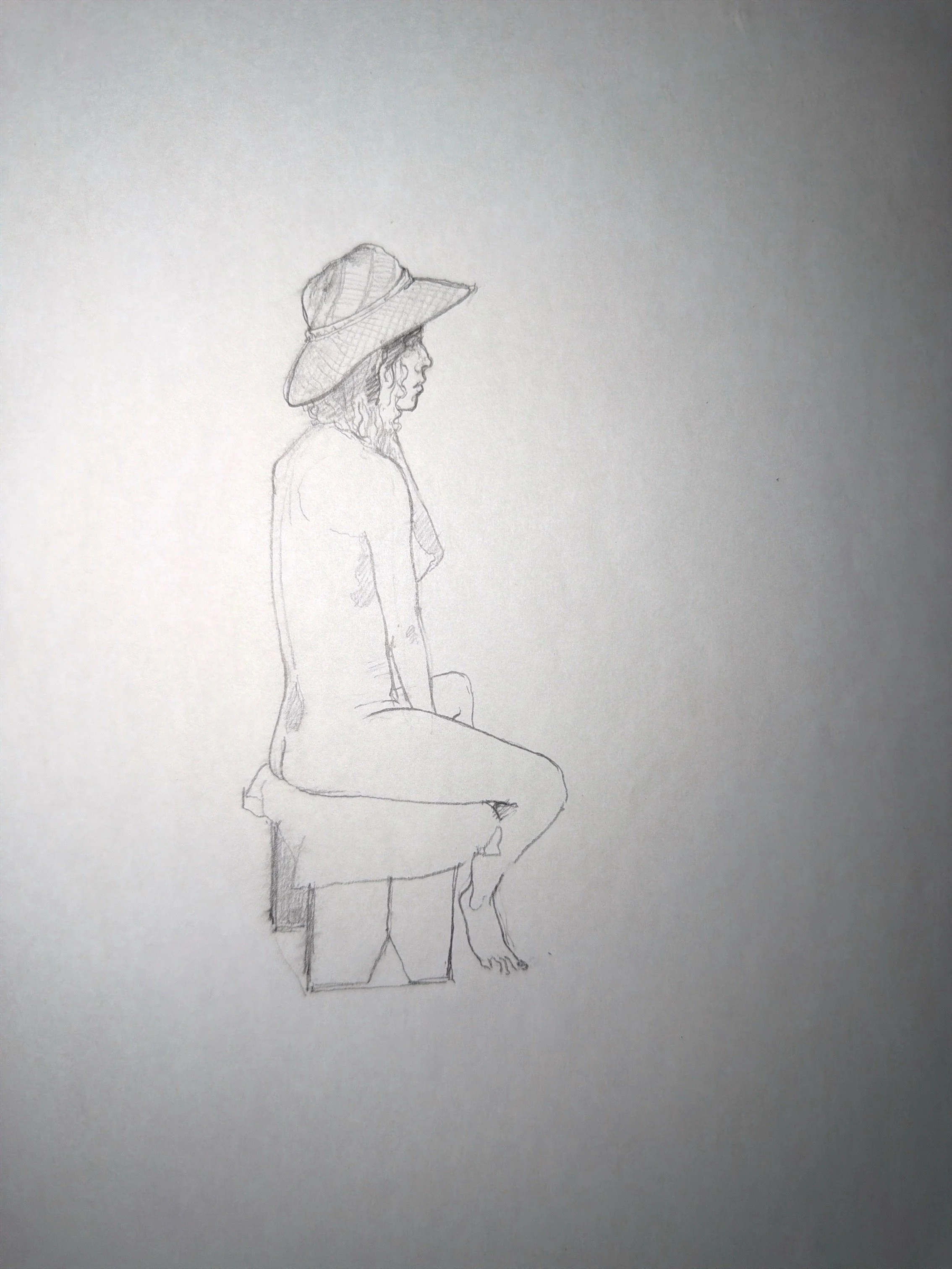 A pencil sketch of a woman sitting on a box, wearing a wide-brimmed hat, with her profile visible. She appears to be in a relaxed pose, with one leg crossed over the other and her hands resting in her lap.