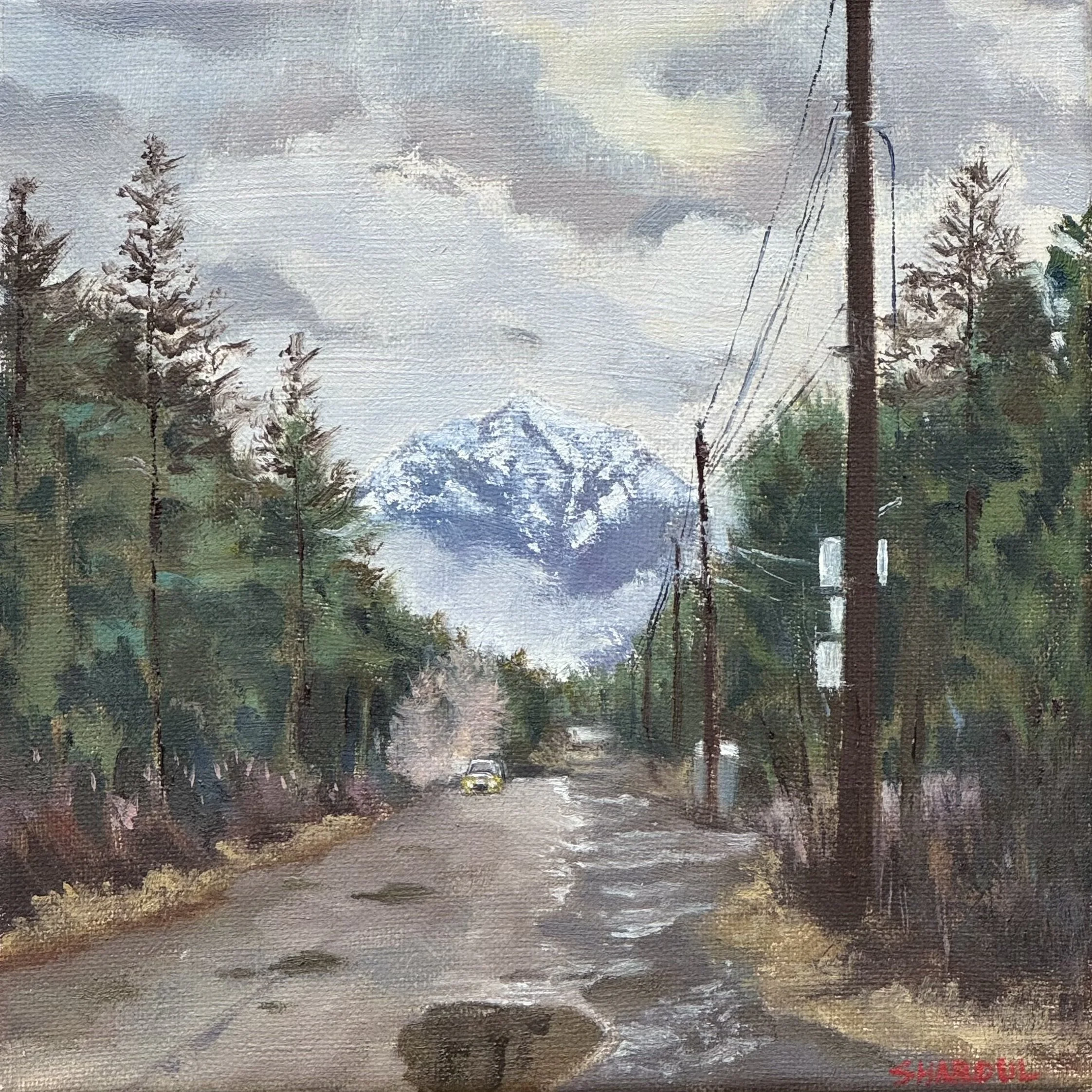 A painting of a landscape featuring trees and mountains under a cloudy sky, with an artist's signature in red at the bottom right corner.