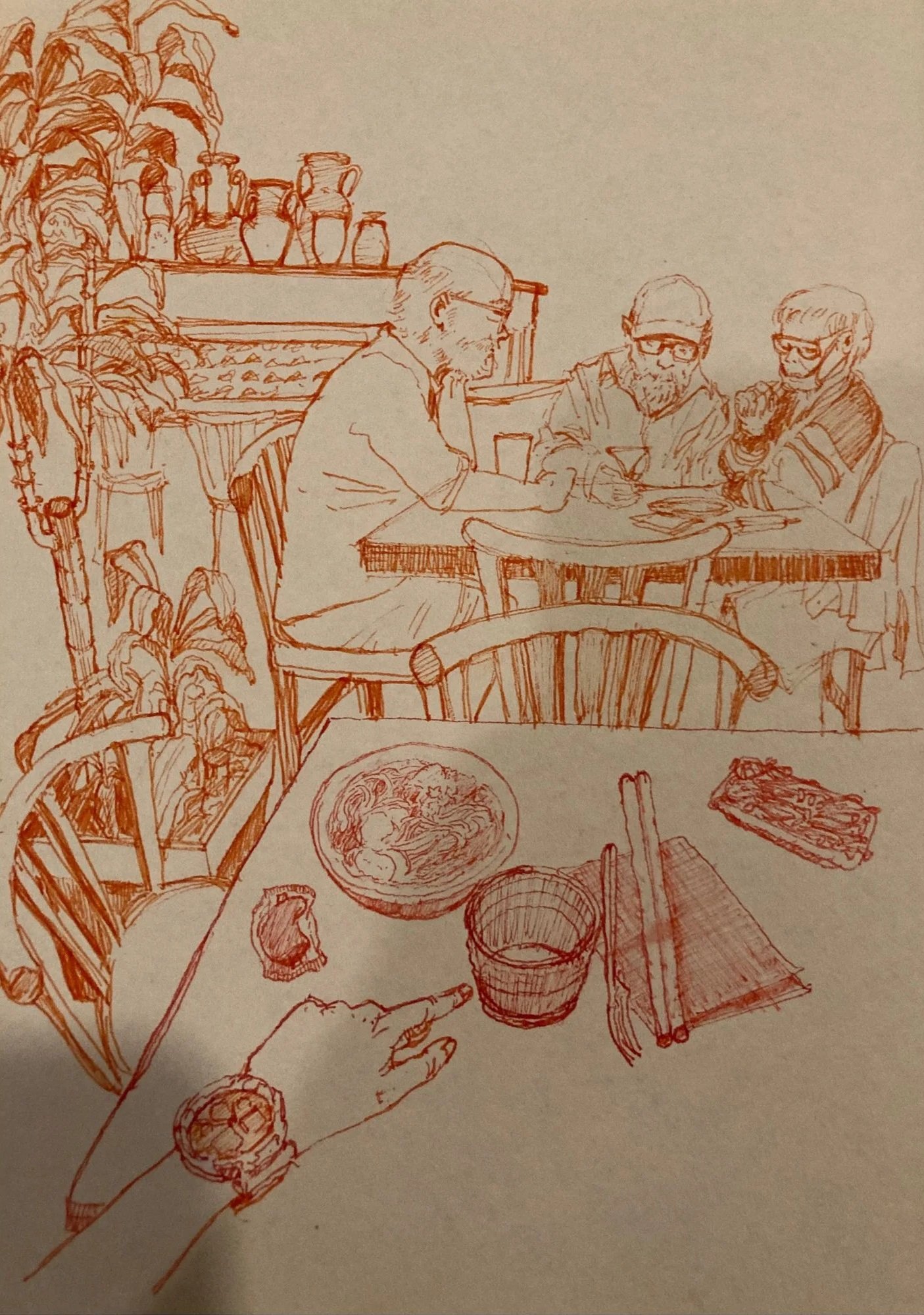 A detailed sketch of three people sitting at a dining table with various dishes, chopsticks, a glass, and a notebook, surrounded by shelves with pottery and plants.