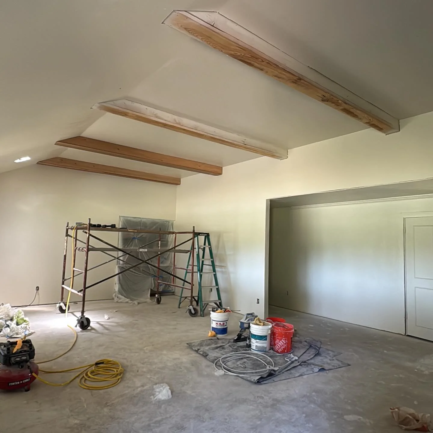 Exposed beam trim in Choctaw, OK. Cedar planks installed over exposed beams. #remodelok #choctawok #remodeler #carpentry #exposedbeams