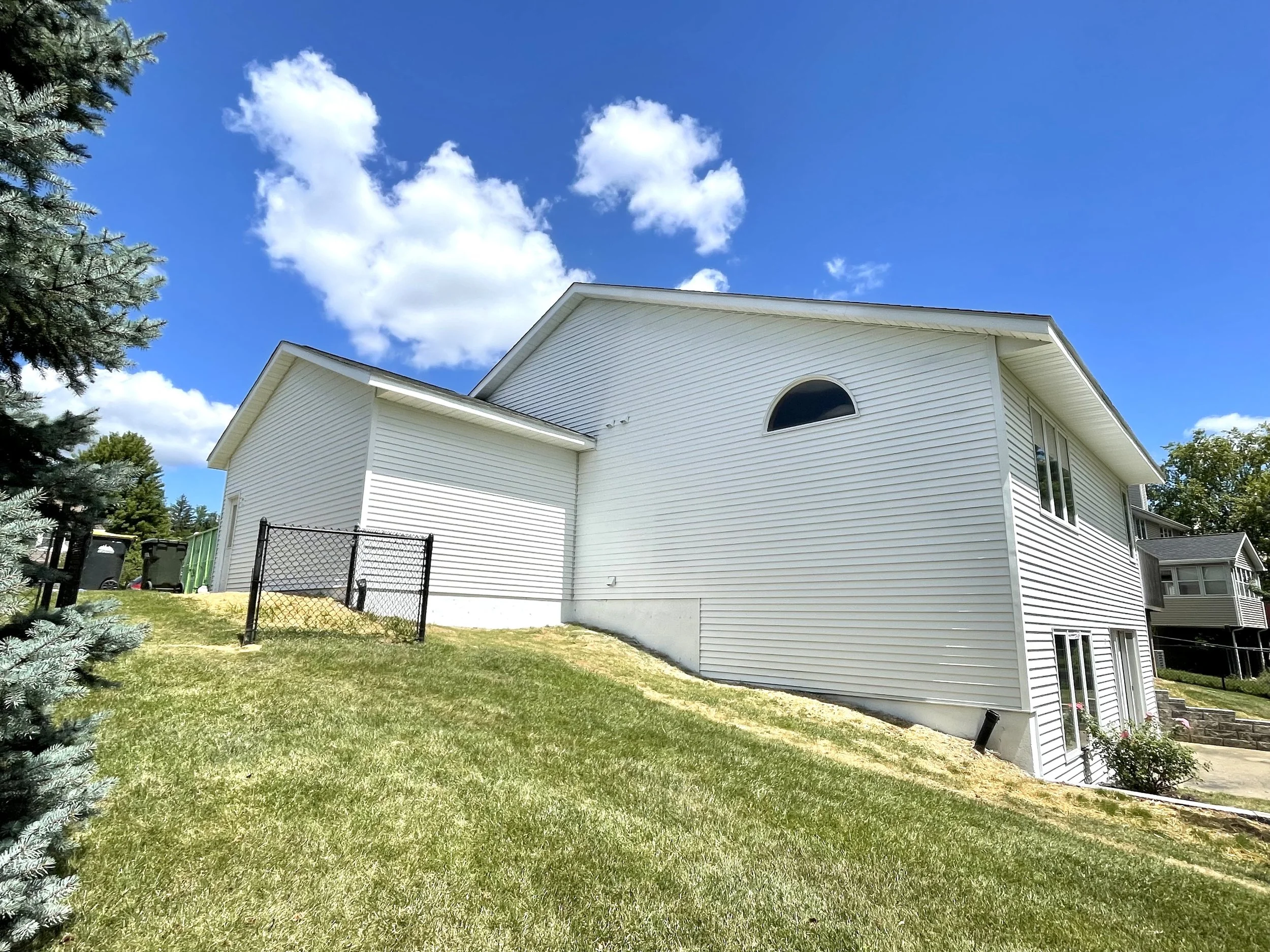 Exterior house paint in Oklahoma. Exterior house painted bright white