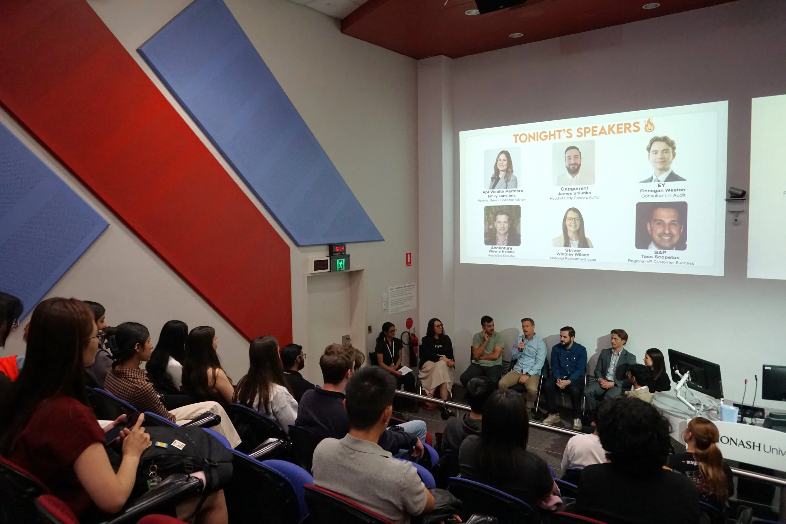 CCA 2026 Fireside Panel: student attendees listening to speakers at the front