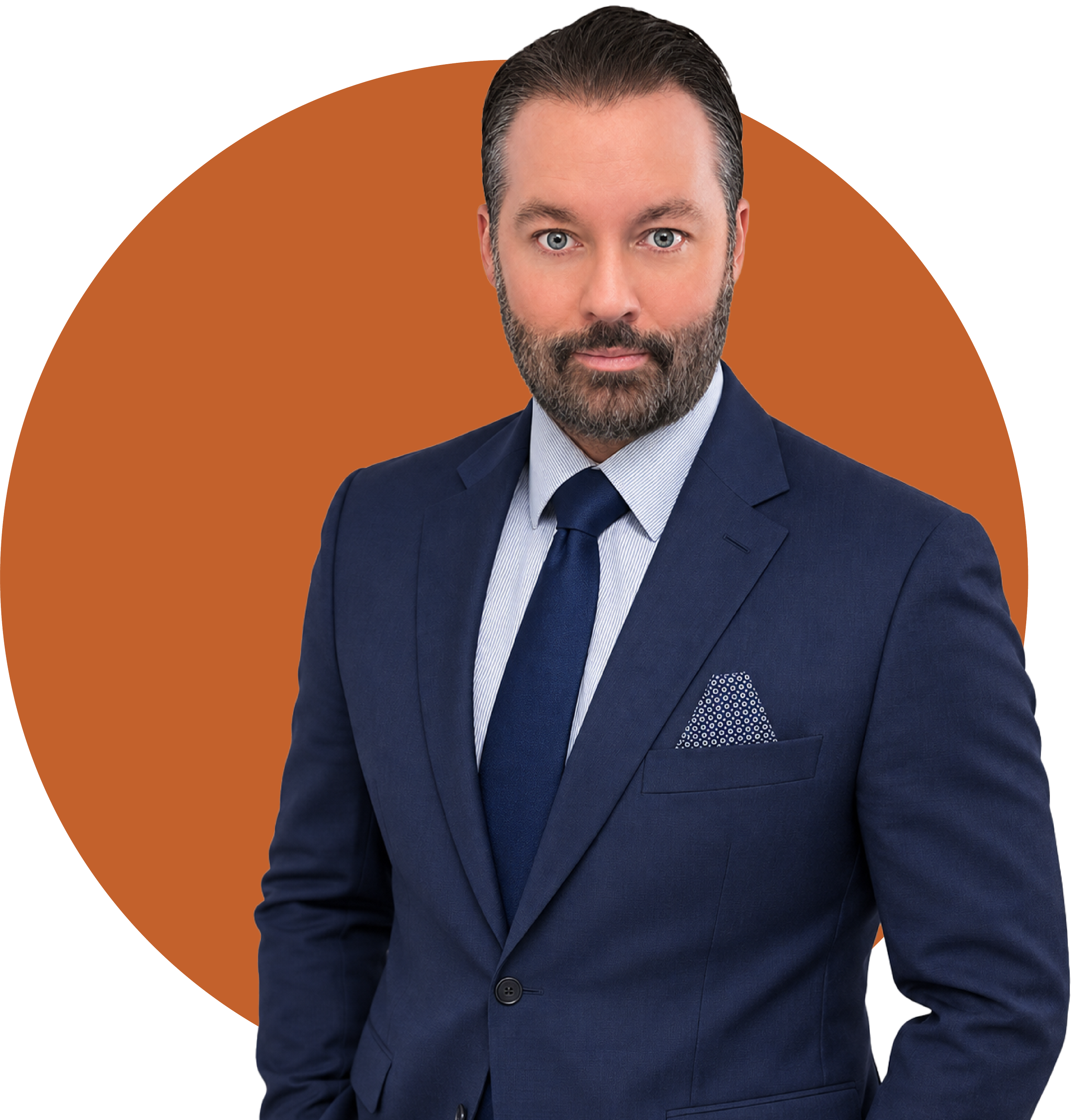 A man in a navy blue suit with a light blue shirt and navy tie, standing in front of a background with a large orange arc and black and white sections.