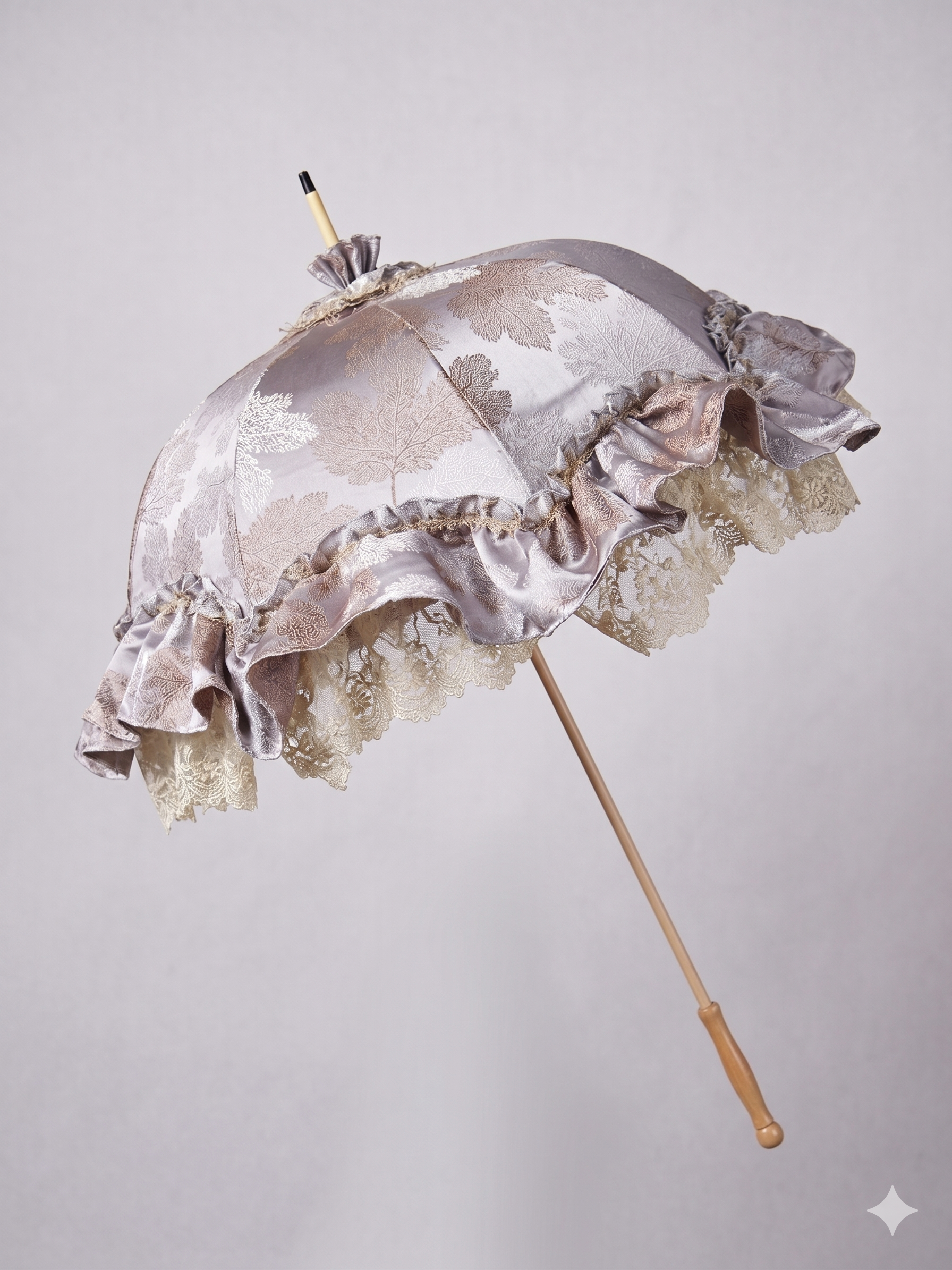 Pale purple satin parasol with leaf detail