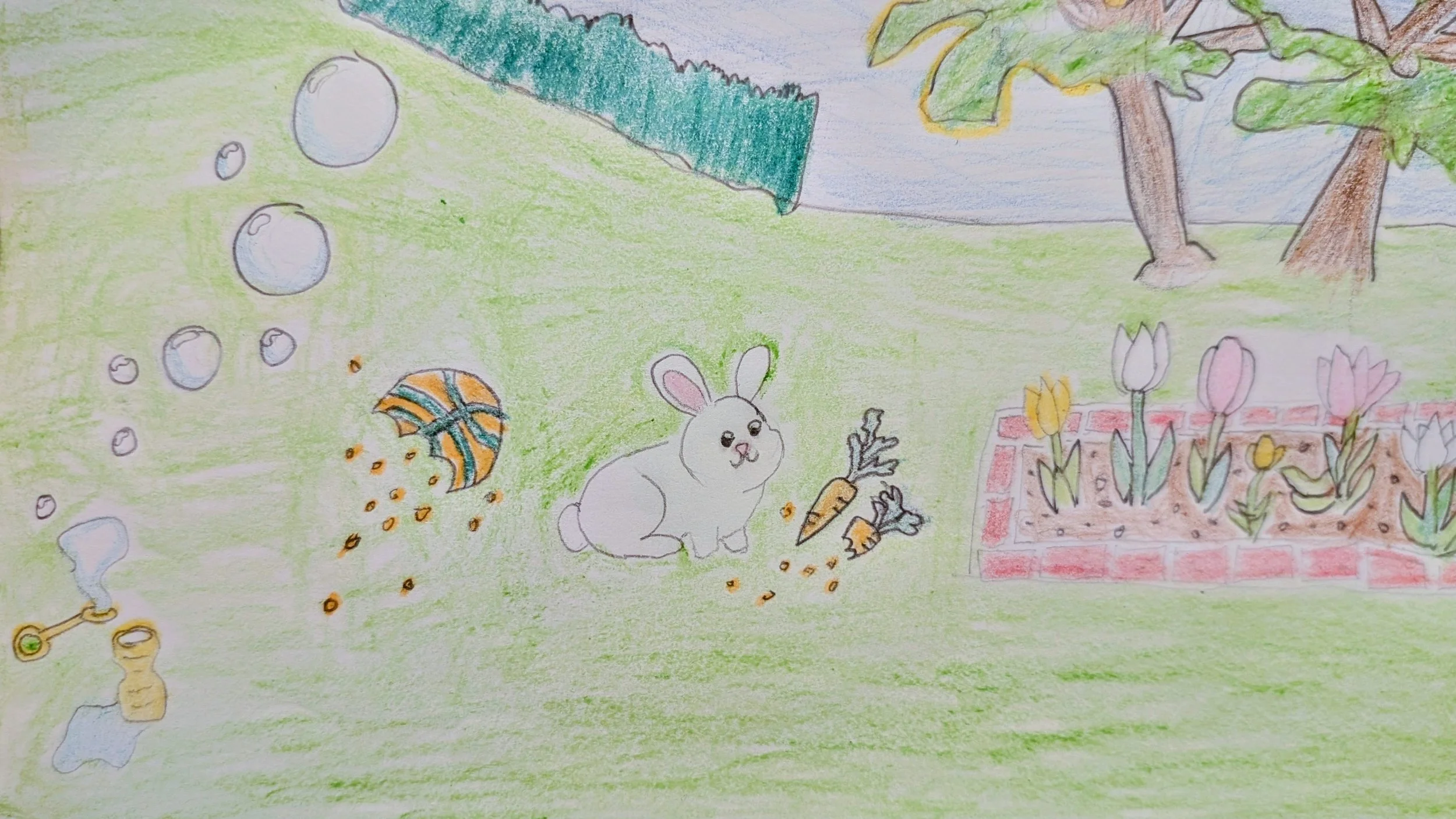 A colorful children's drawing depicting a garden scene with grass, trees, tulips, a rabbit, carrots, a decorated ball, and a watering can.