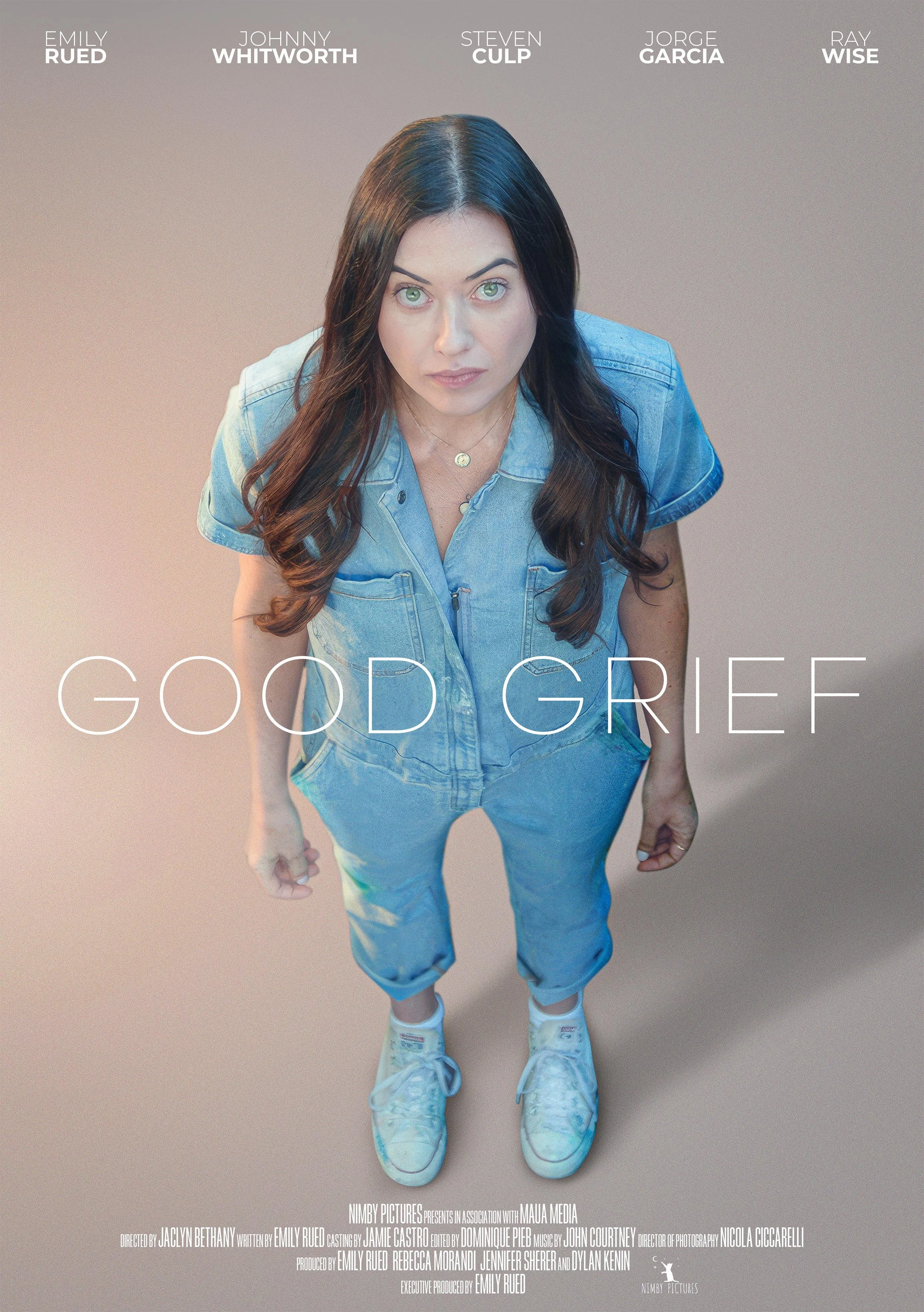 A woman wearing a denim shirt and jeans, with green eyes and dark hair, looking up at the camera. Text at the top lists names: Emily Rued, Johnny Whitworth, Steven Culp, Jorge Garcia, Ray Wise. Text at the bottom credits production, direction, writing, cast, editing, music, photography, and production companies.