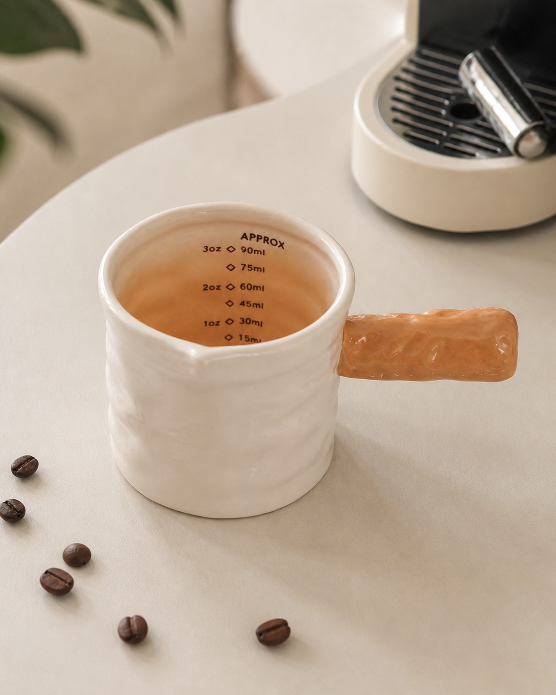 Minimalist ceramic espresso cup with glossy light brown handle, perfect for latte shots, milk pouring, coffee brewing and cosy modern café aesthetics.