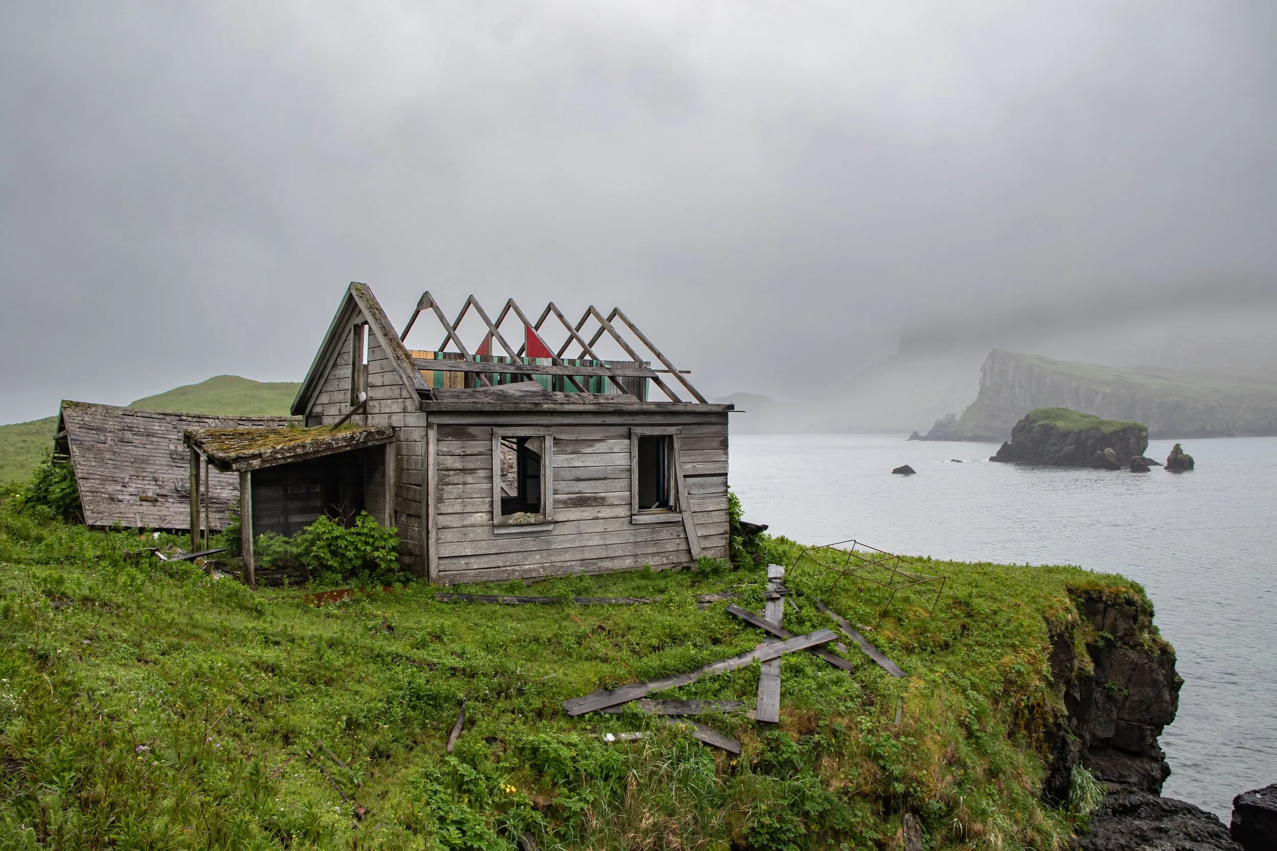 Abandoned homestead on Unga Island in the Shumagin Islands group, off the South coast of Alaska.